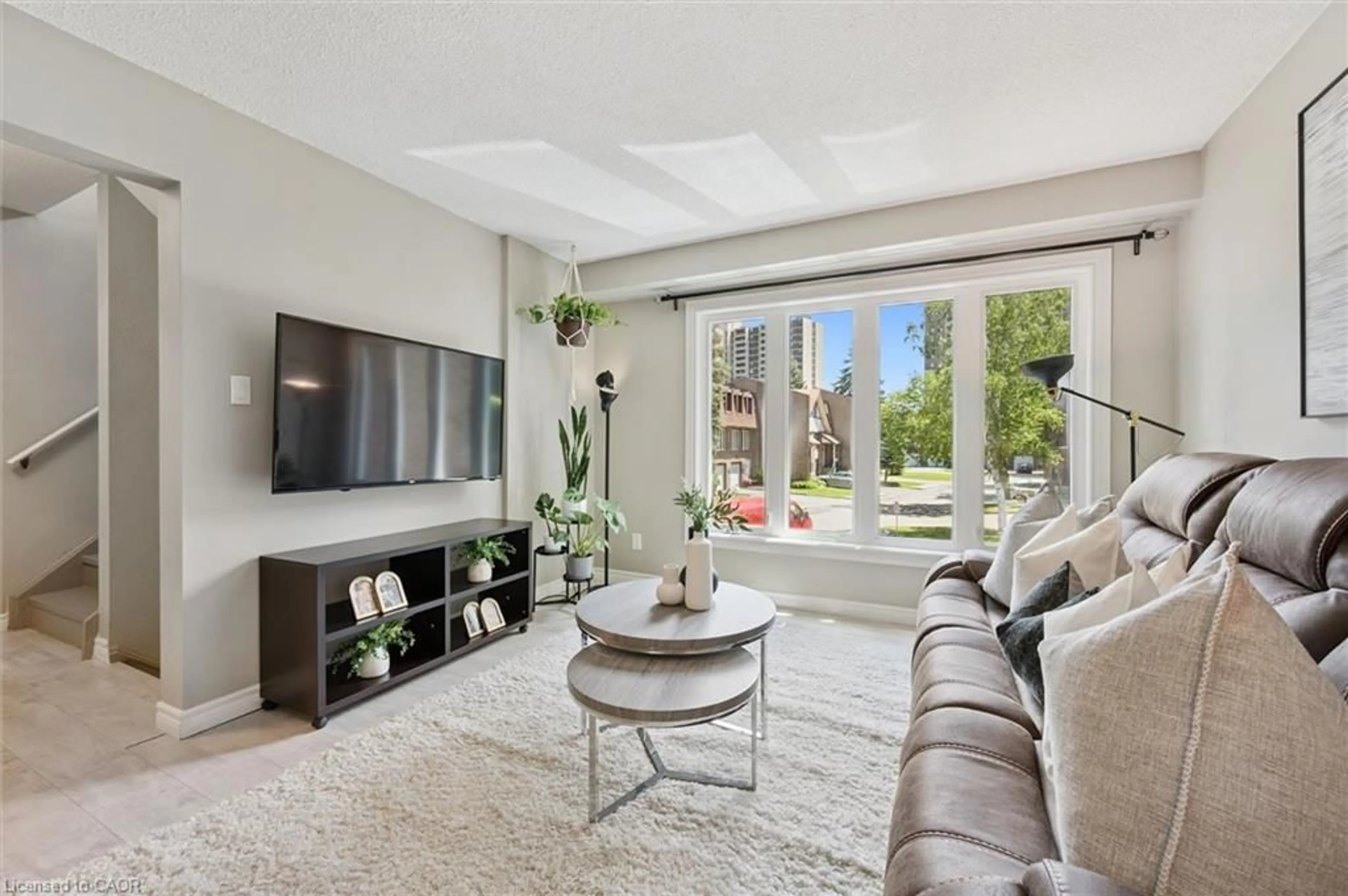 Living room with furniture, unknown for 49 Cedarwoods Cres #53, Kitchener Ontario N2C 2L1