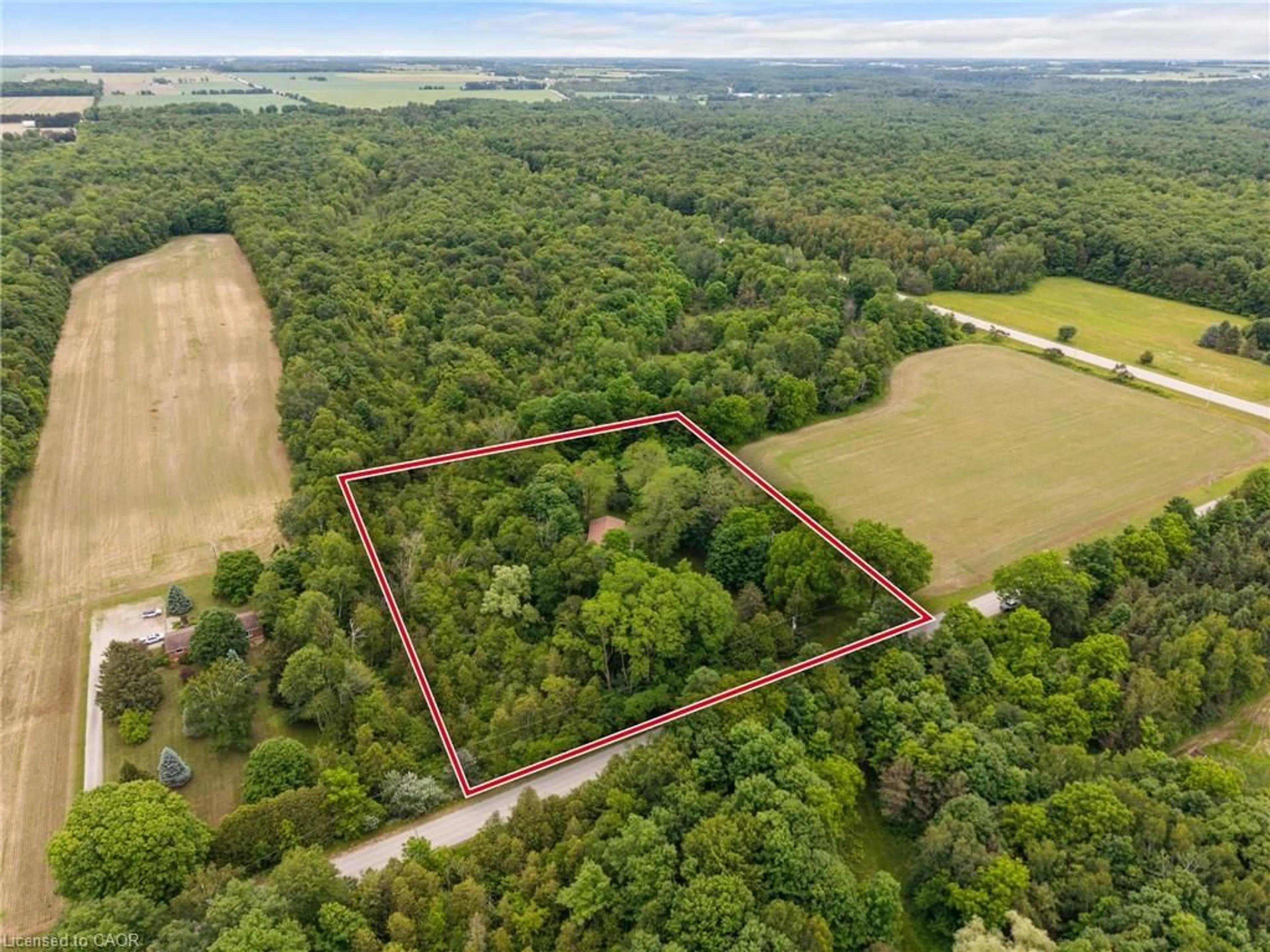 A pic from outside/outdoor area/front of a property/back of a property/a pic from drone, forest/trees view for 77446 Orchard Line, Bayfield Ontario N0M 1G0