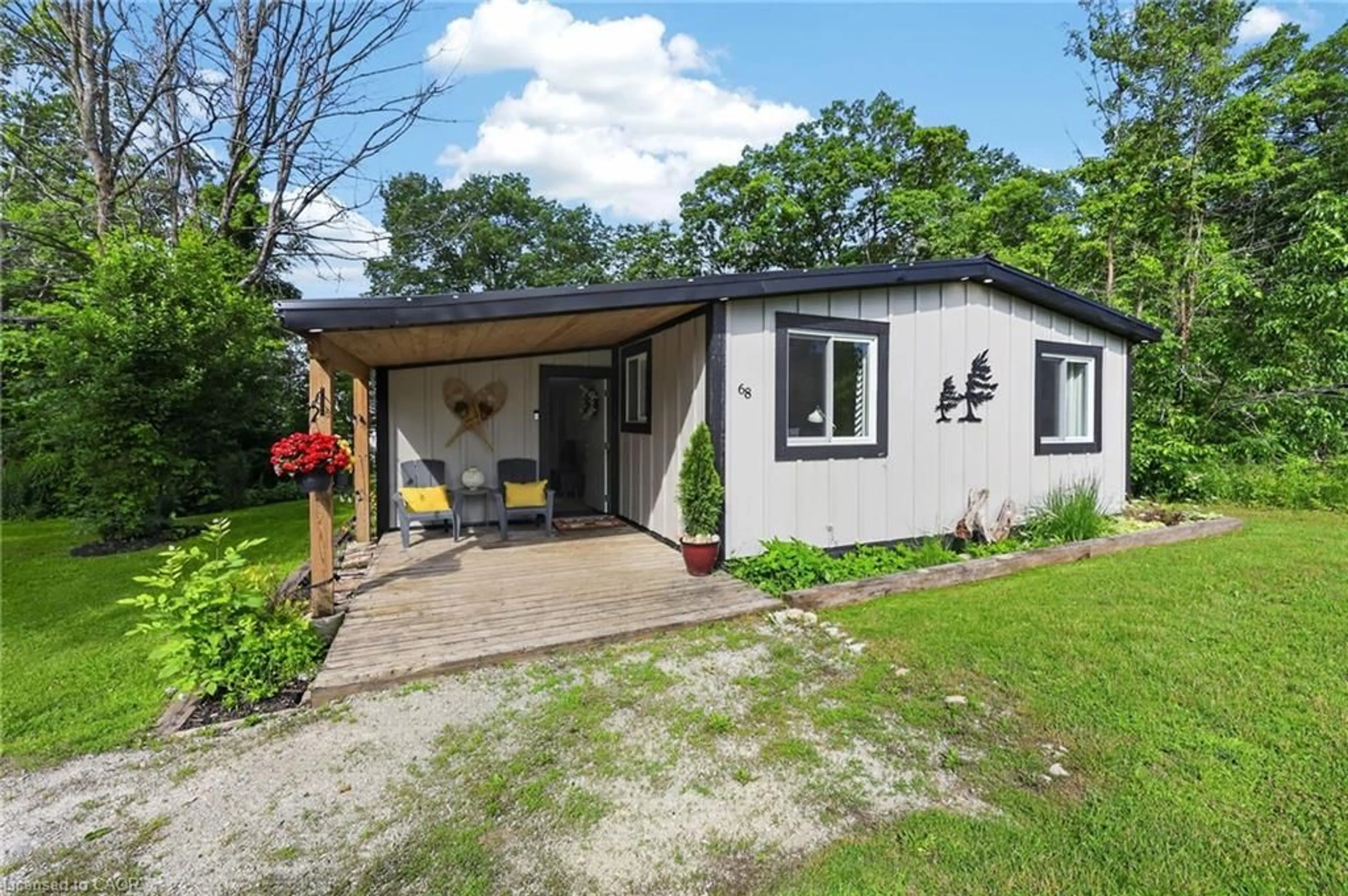 Home with vinyl exterior material, street for 68 Forest Harbour Pky, Waubaushene Ontario L0K 2C0