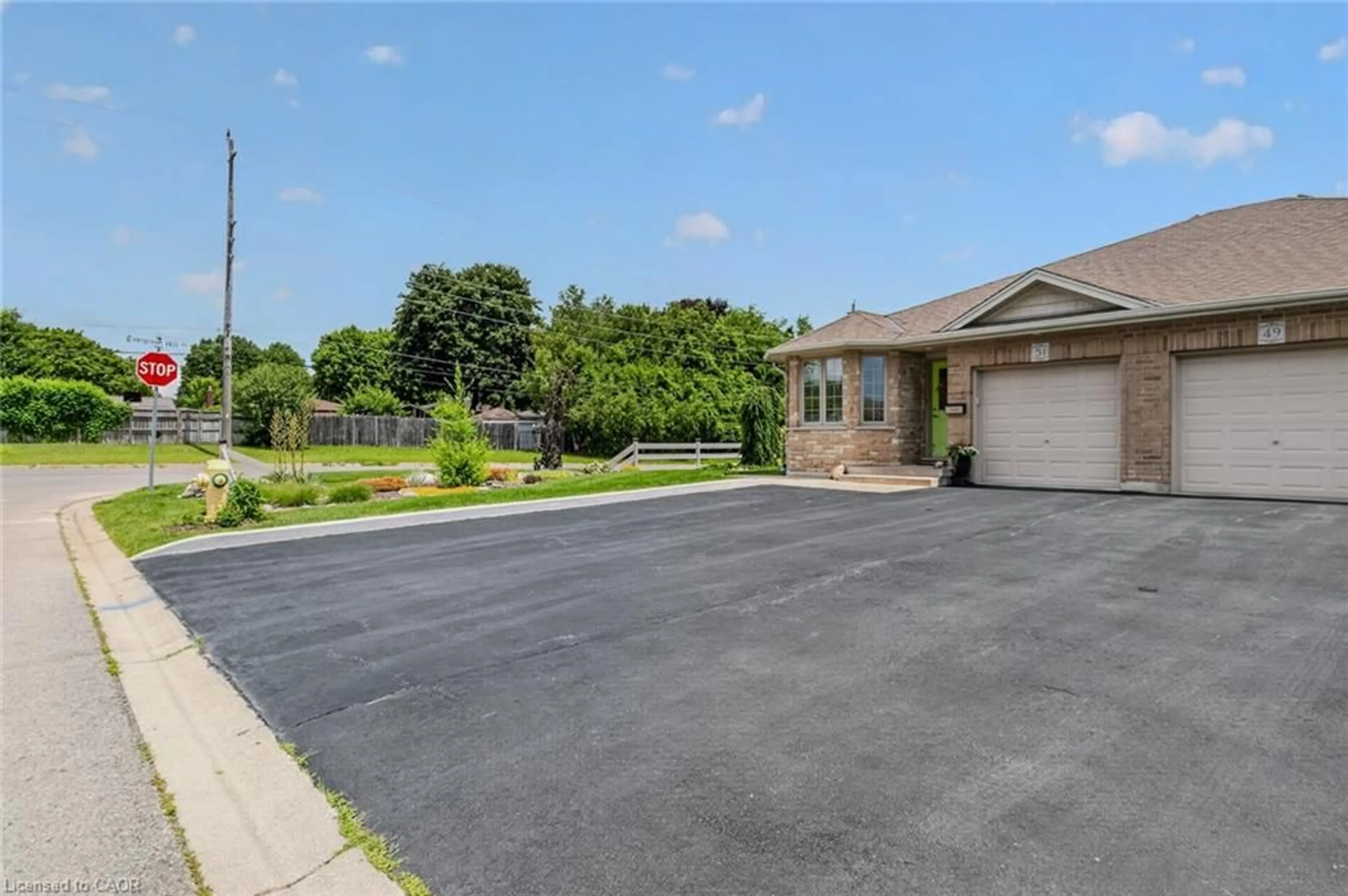 A pic from outside/outdoor area/front of a property/back of a property/a pic from drone, street for 51 Millcroft Dr, Simcoe Ontario N3Y 0B1