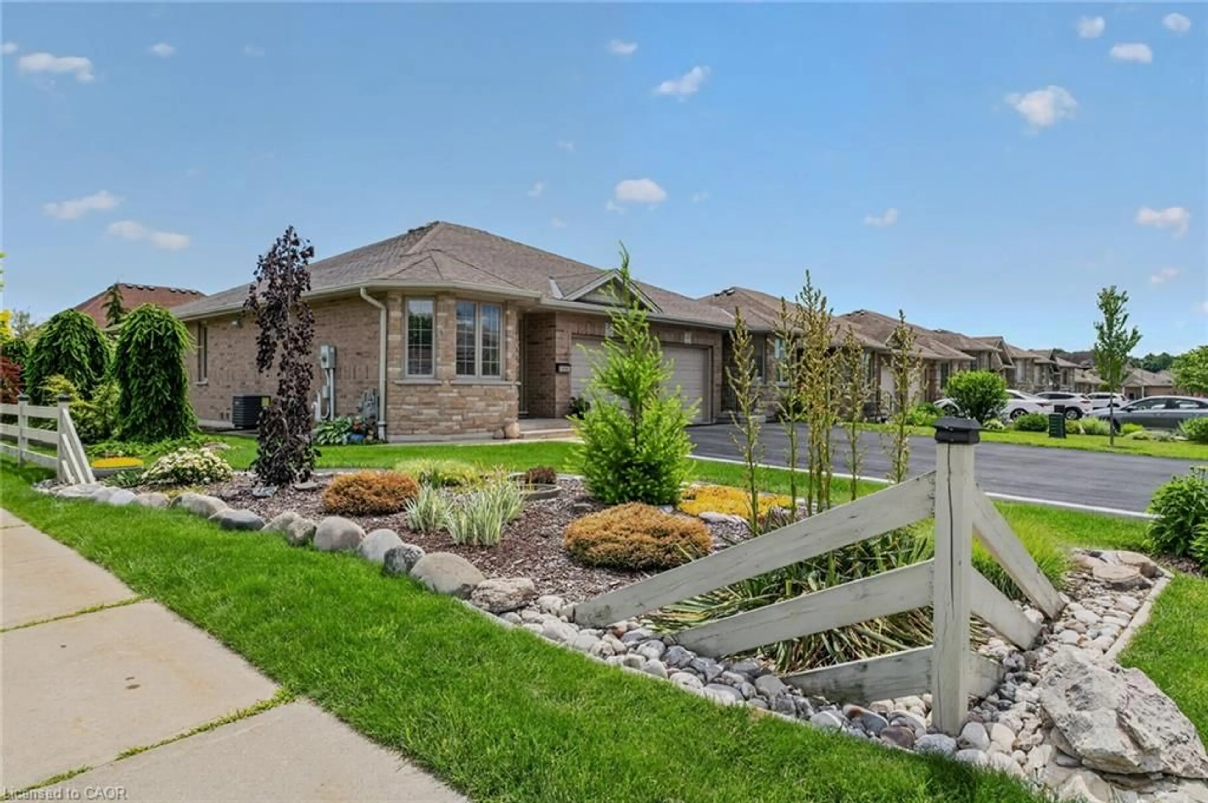 Home with brick exterior material, street for 51 Millcroft Dr, Simcoe Ontario N3Y 0B1