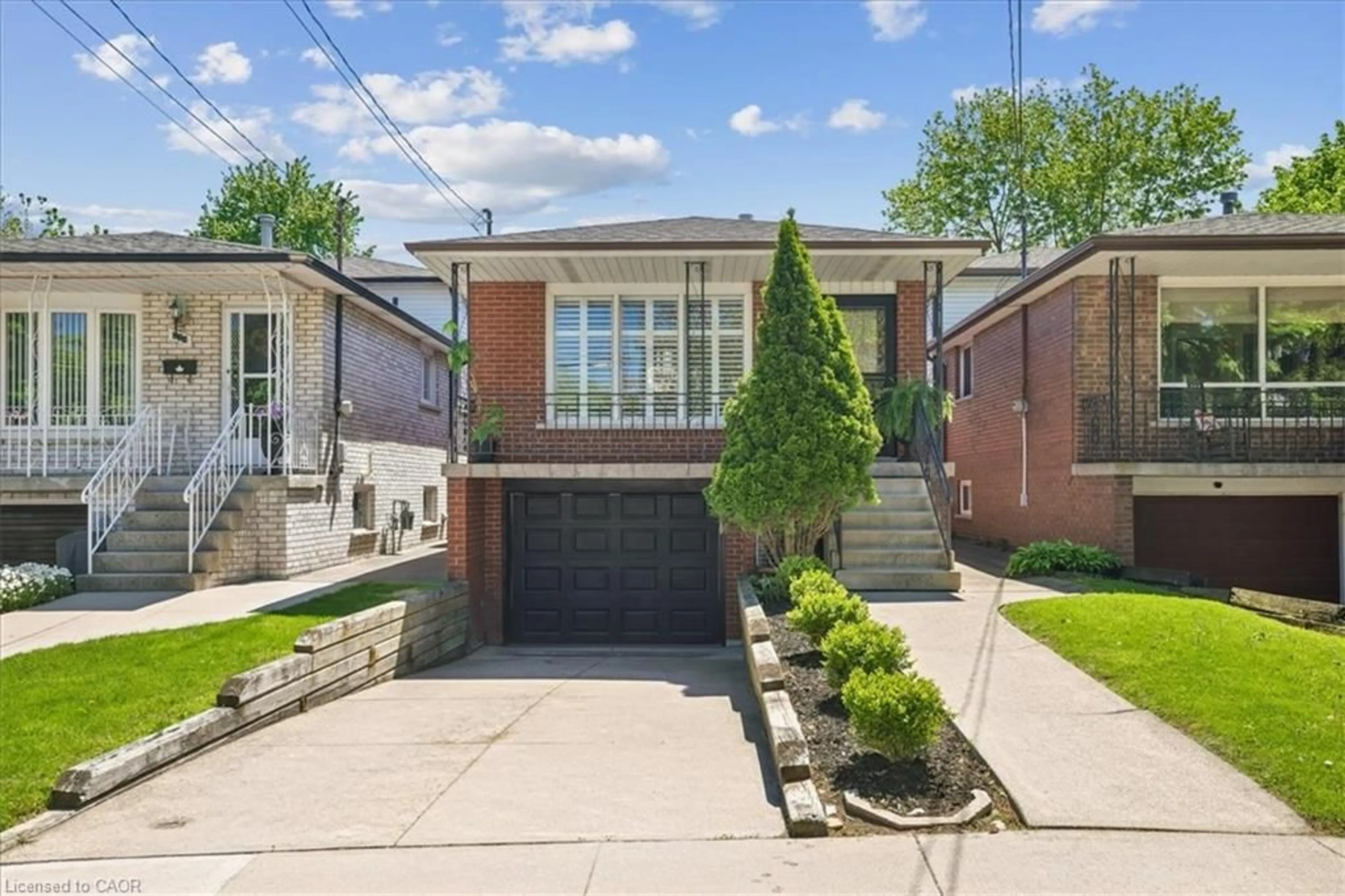 Home with brick exterior material, street for 233 East 8th St, Hamilton Ontario L9A 3L7