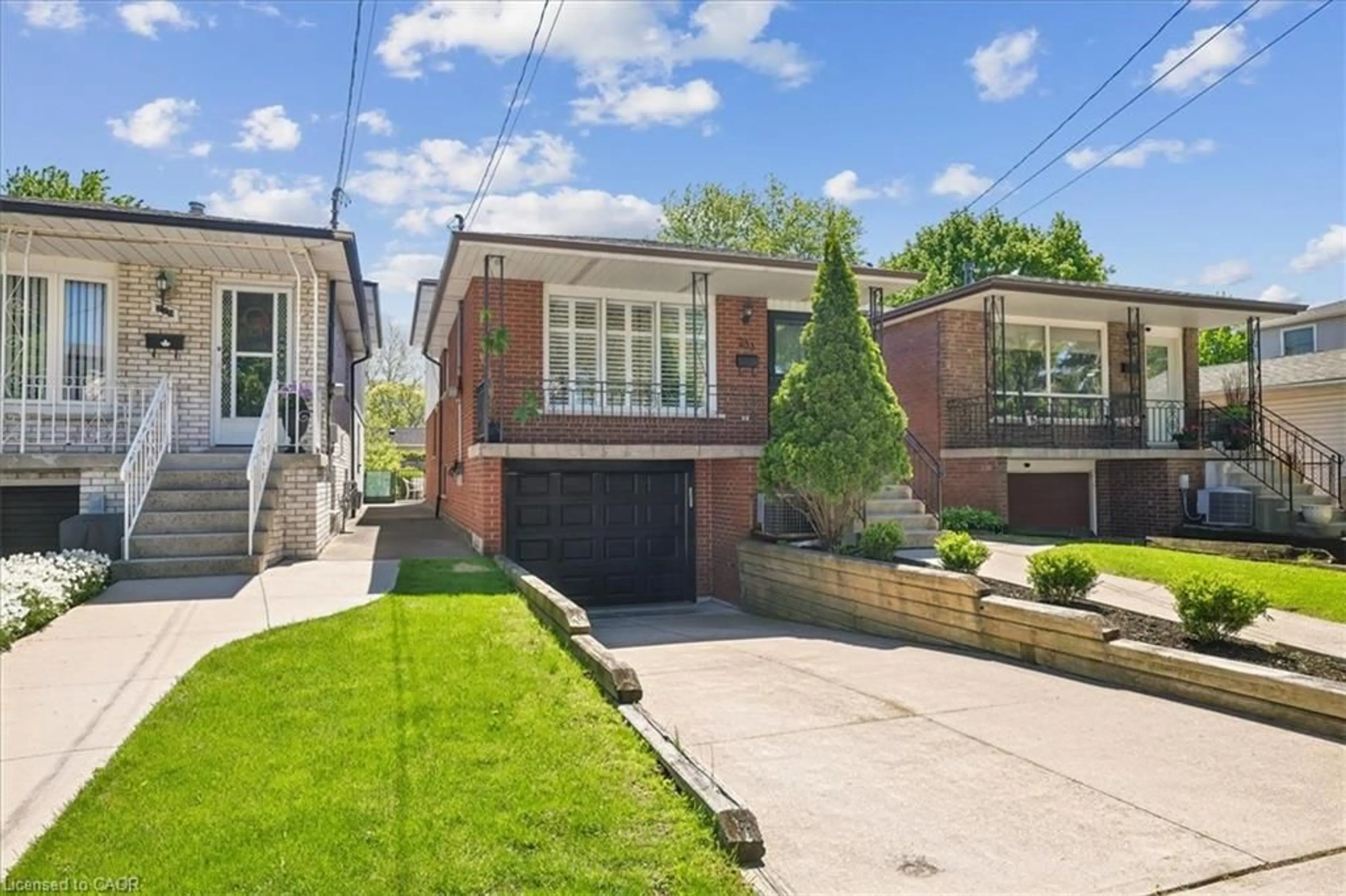 Home with brick exterior material, street for 233 East 8th St, Hamilton Ontario L9A 3L7