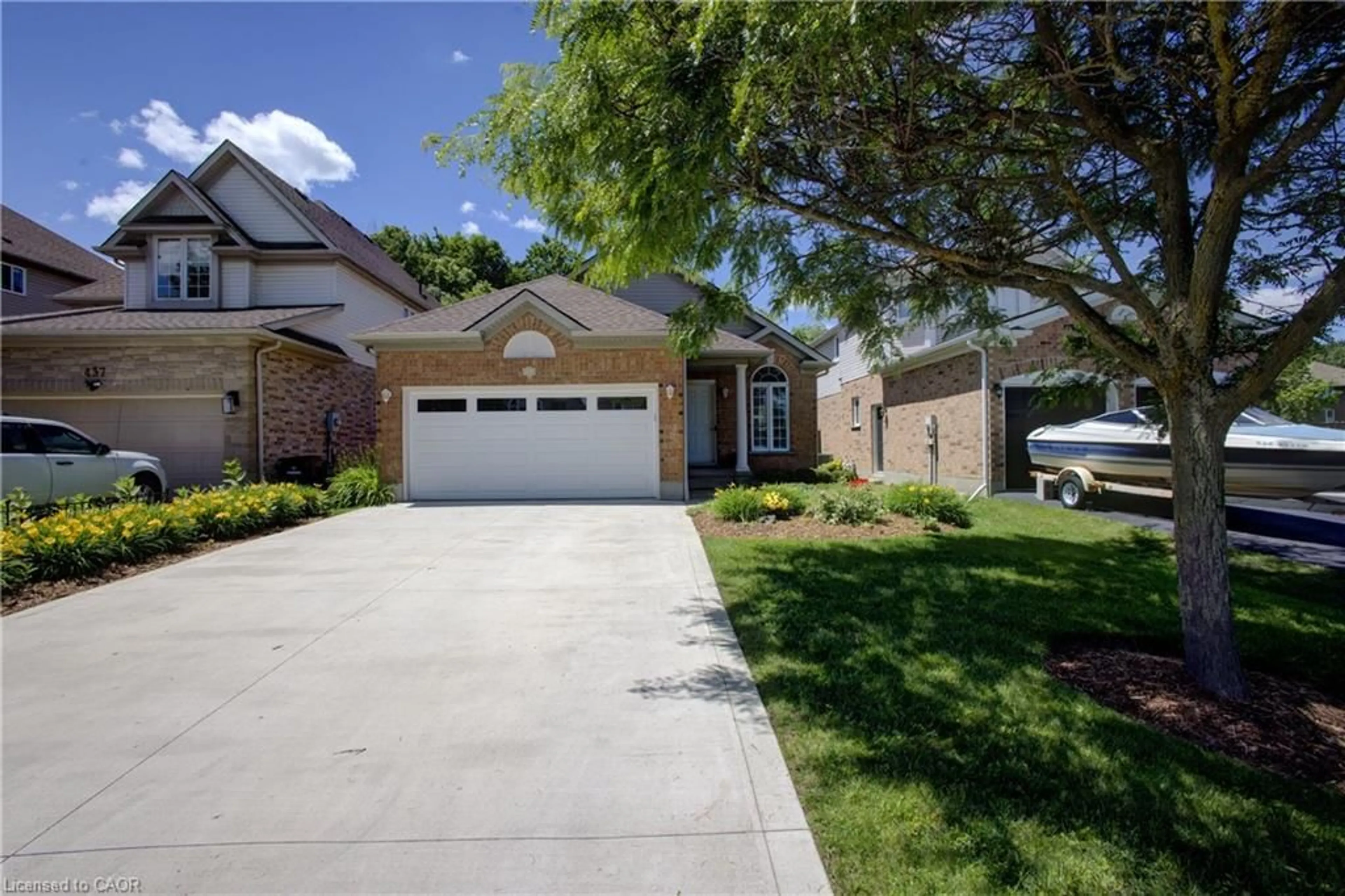Home with brick exterior material, street for 439 Woodrow Dr, Waterloo Ontario N2T 2V6