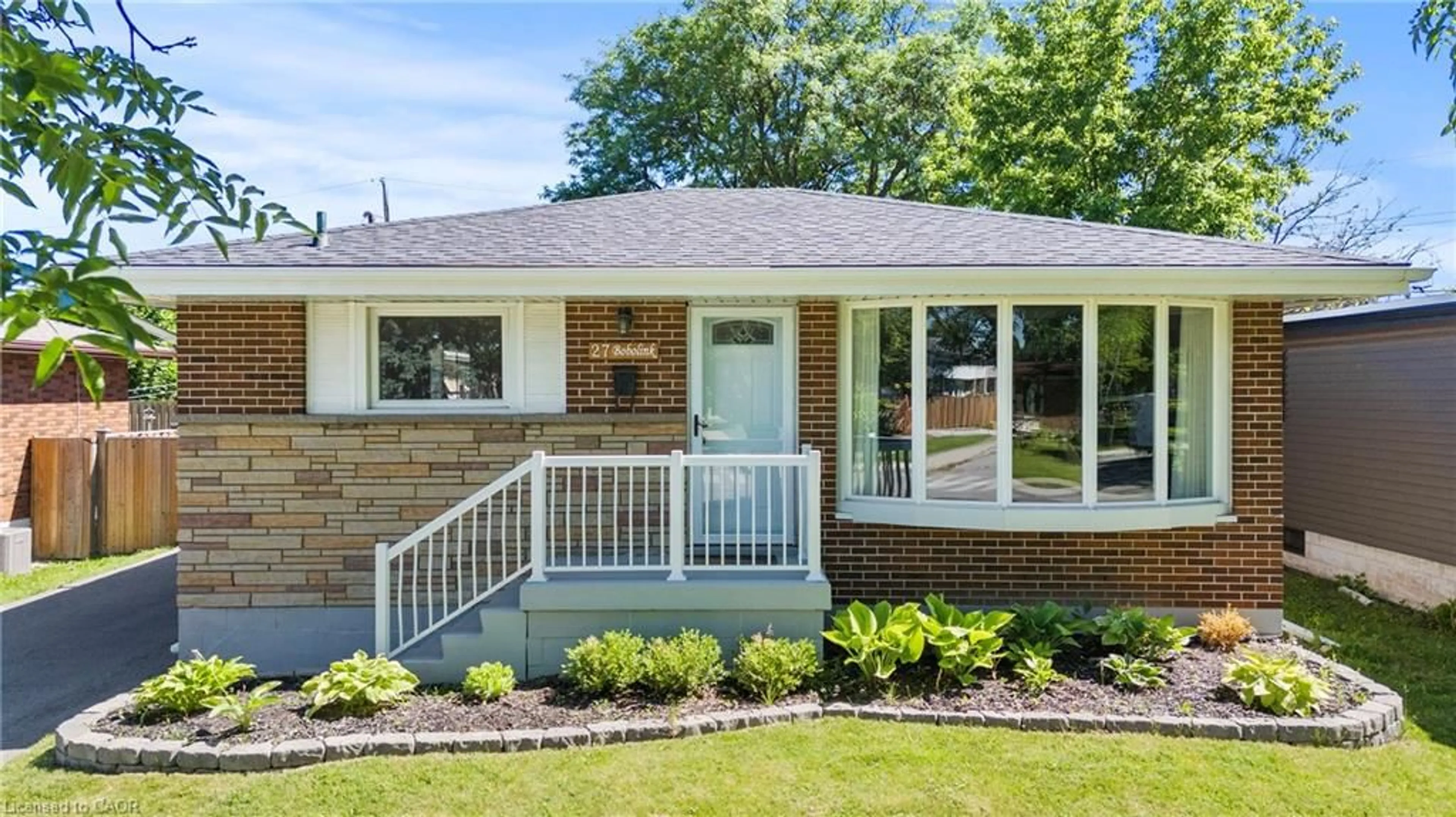 Home with brick exterior material, street for 27 Bobolink Rd, Hamilton Ontario L9A 2P3