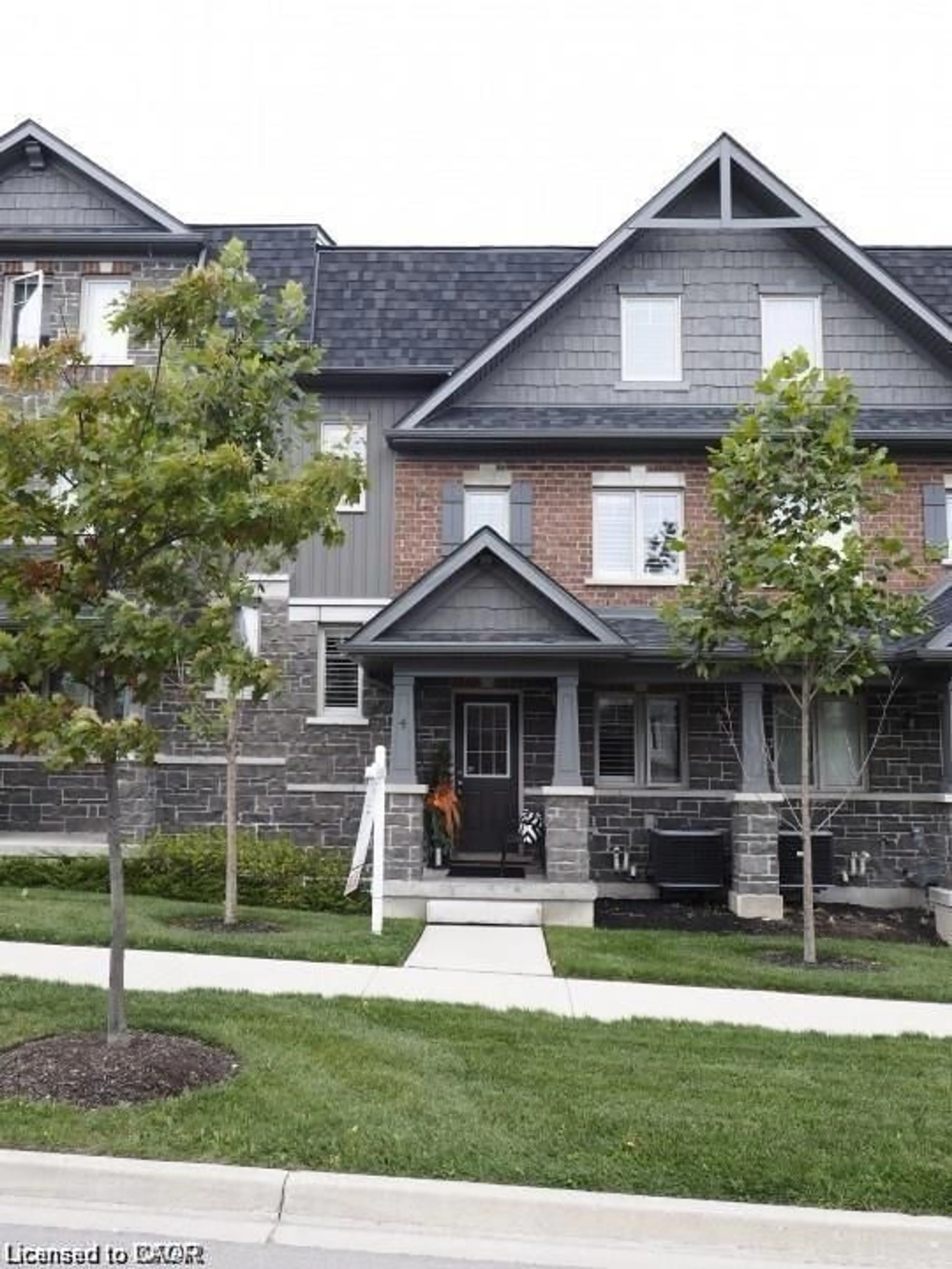 Home with brick exterior material, street for 4 Isaiah Dr, Kitchener Ontario N2E 0C1