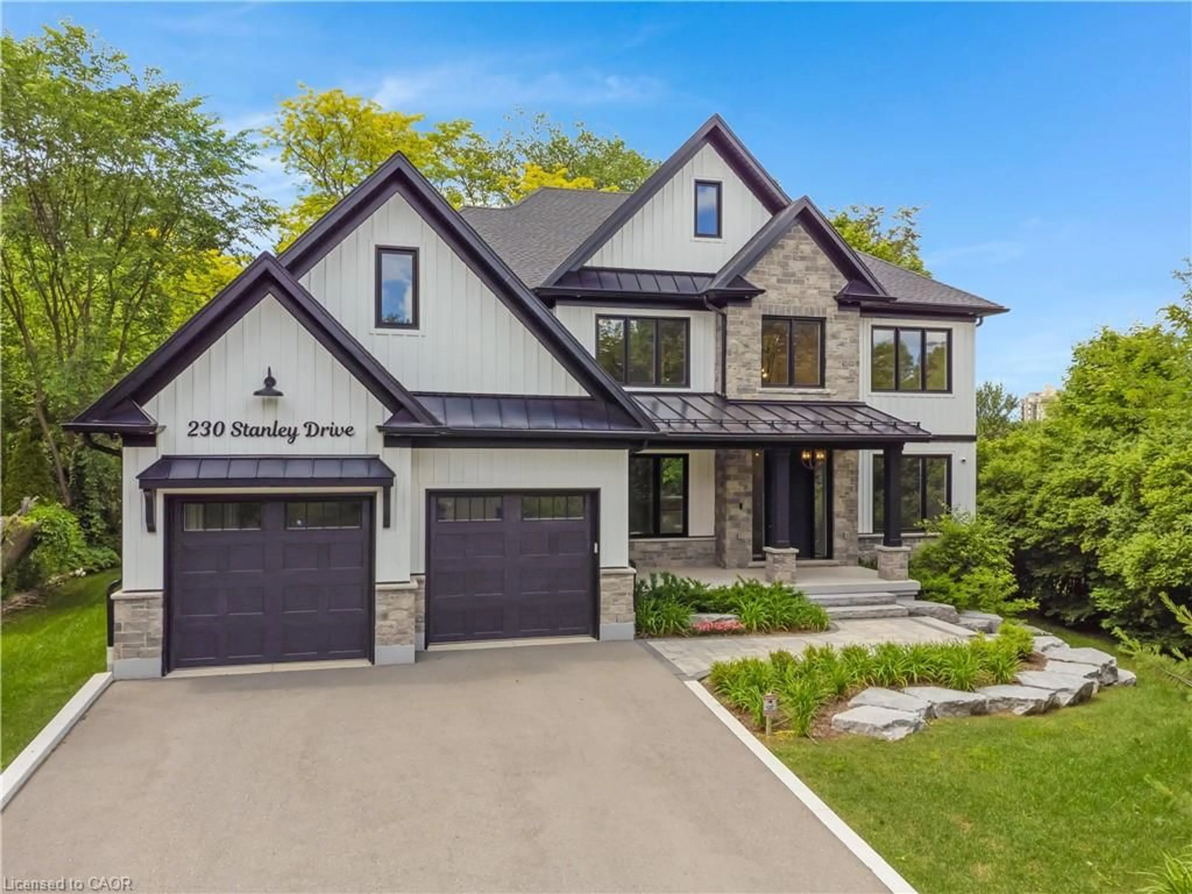 Home with brick exterior material, street for 230 Stanley Dr, Waterloo Ontario N2L 1H7