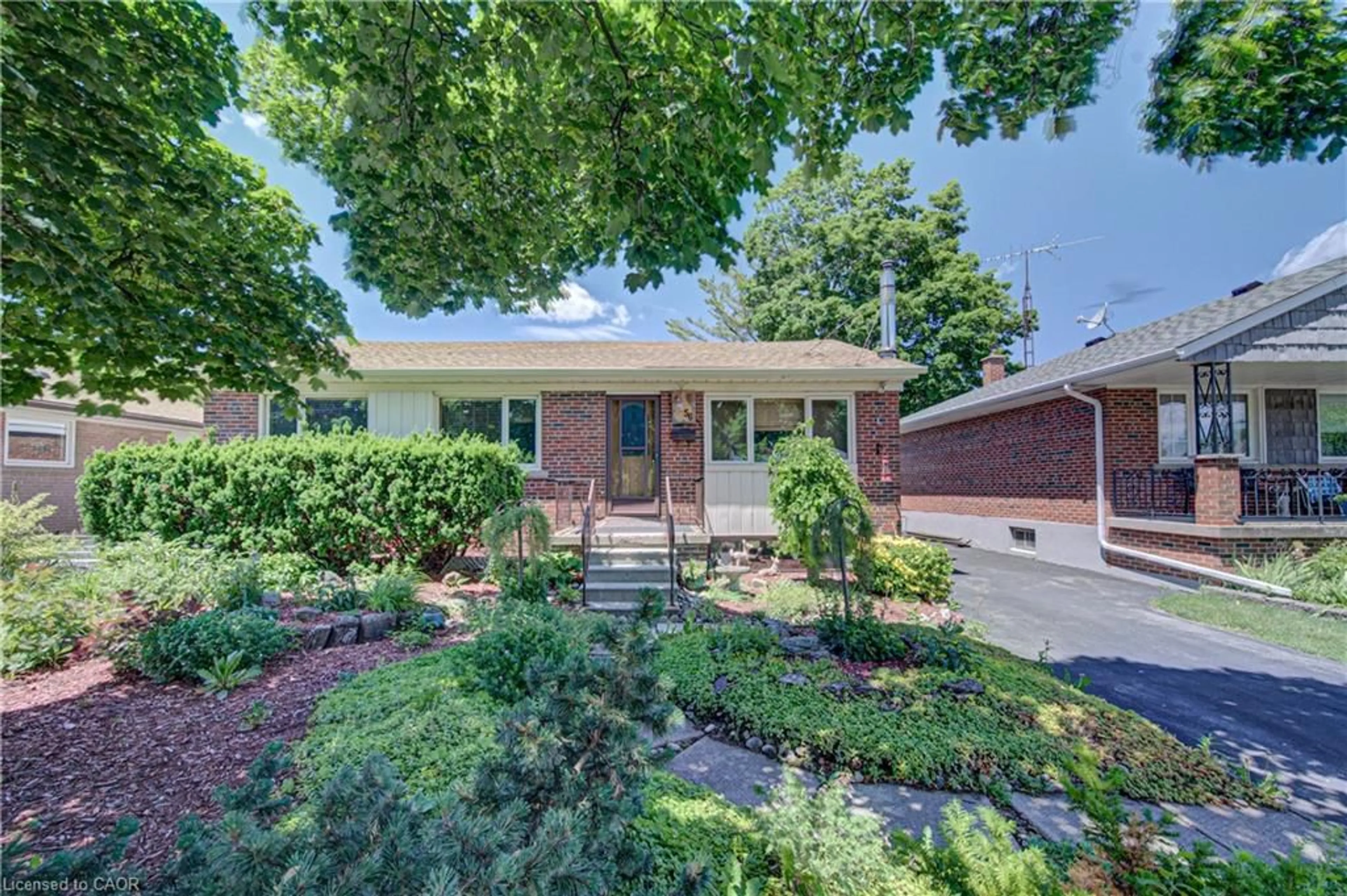 Home with brick exterior material, street for 56 Ferrara St, Hamilton Ontario L8T 4C4