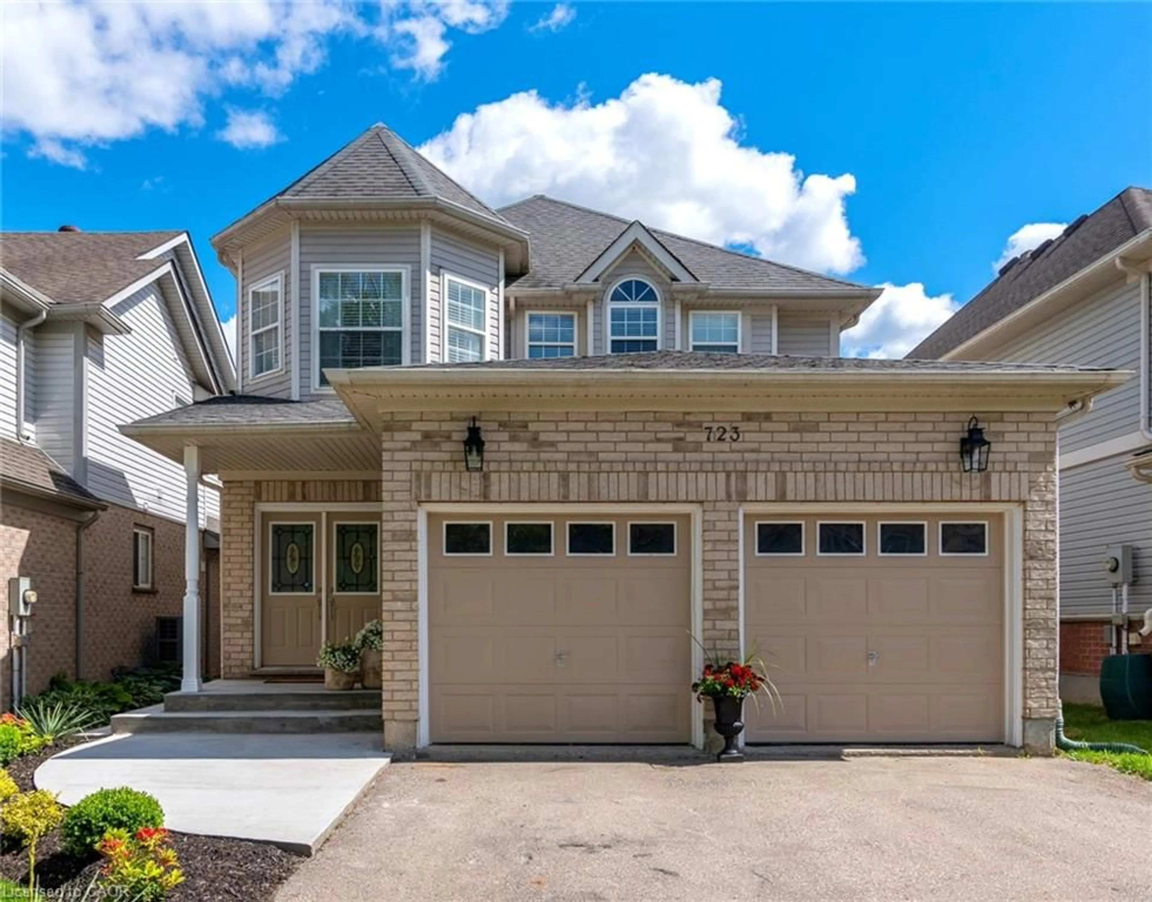 Home with brick exterior material, street for 723 Brookmill Pl, Waterloo Ontario N2V 2P1