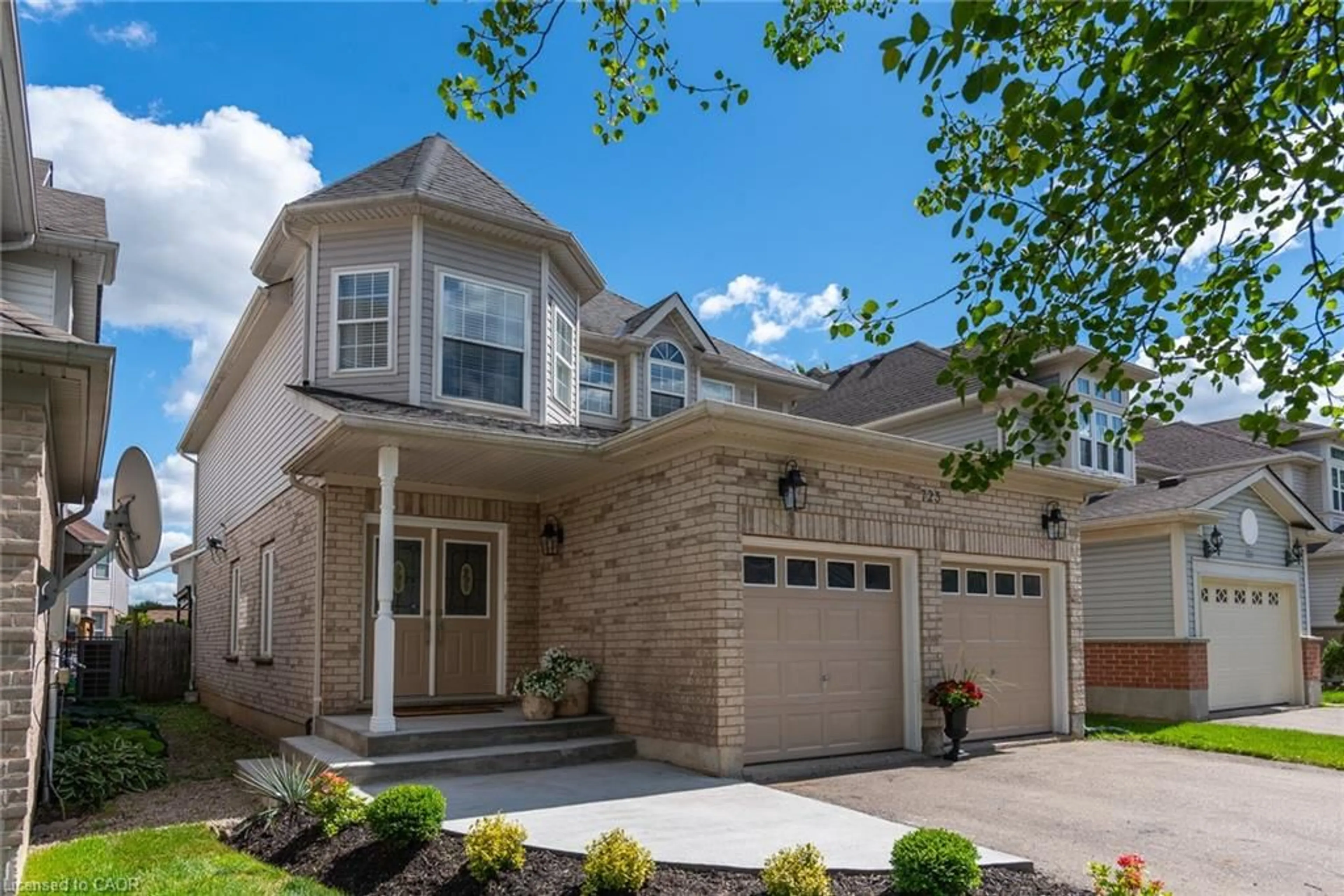 Home with brick exterior material, street for 723 Brookmill Pl, Waterloo Ontario N2V 2P1