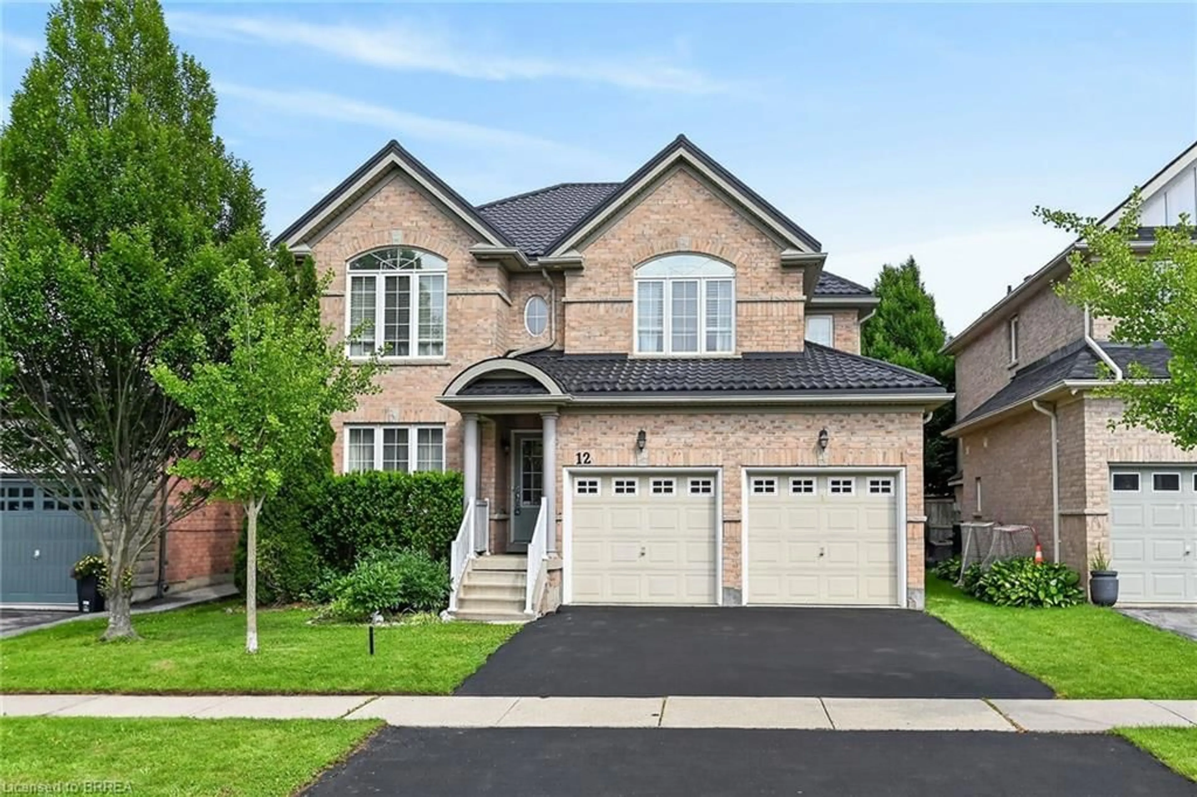 Home with brick exterior material, street for 12 Barrett Ave, Brantford Ontario N3S 0B2