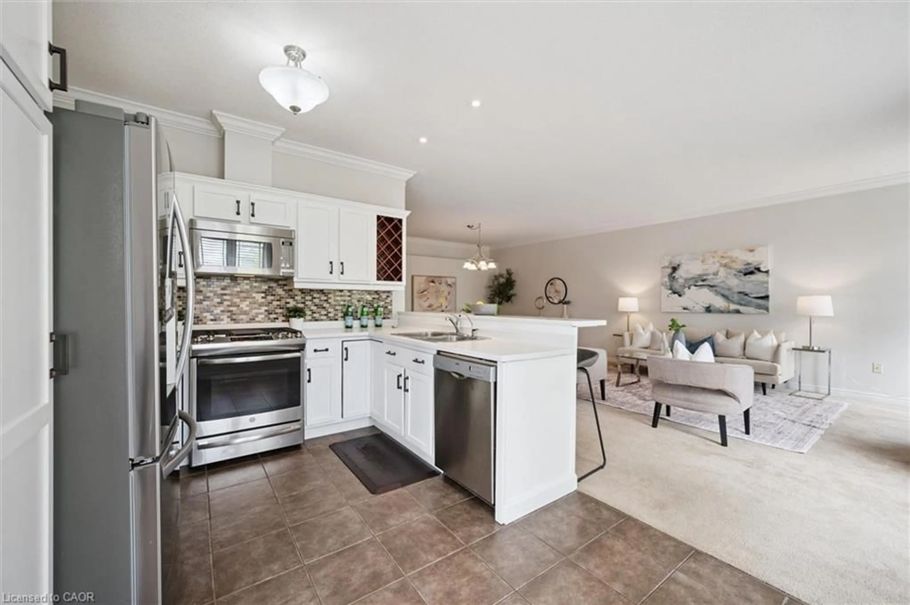 Open concept kitchen, ceramic/tile floor for 20 Isherwood Ave #51, Cambridge Ontario N1R 8P9