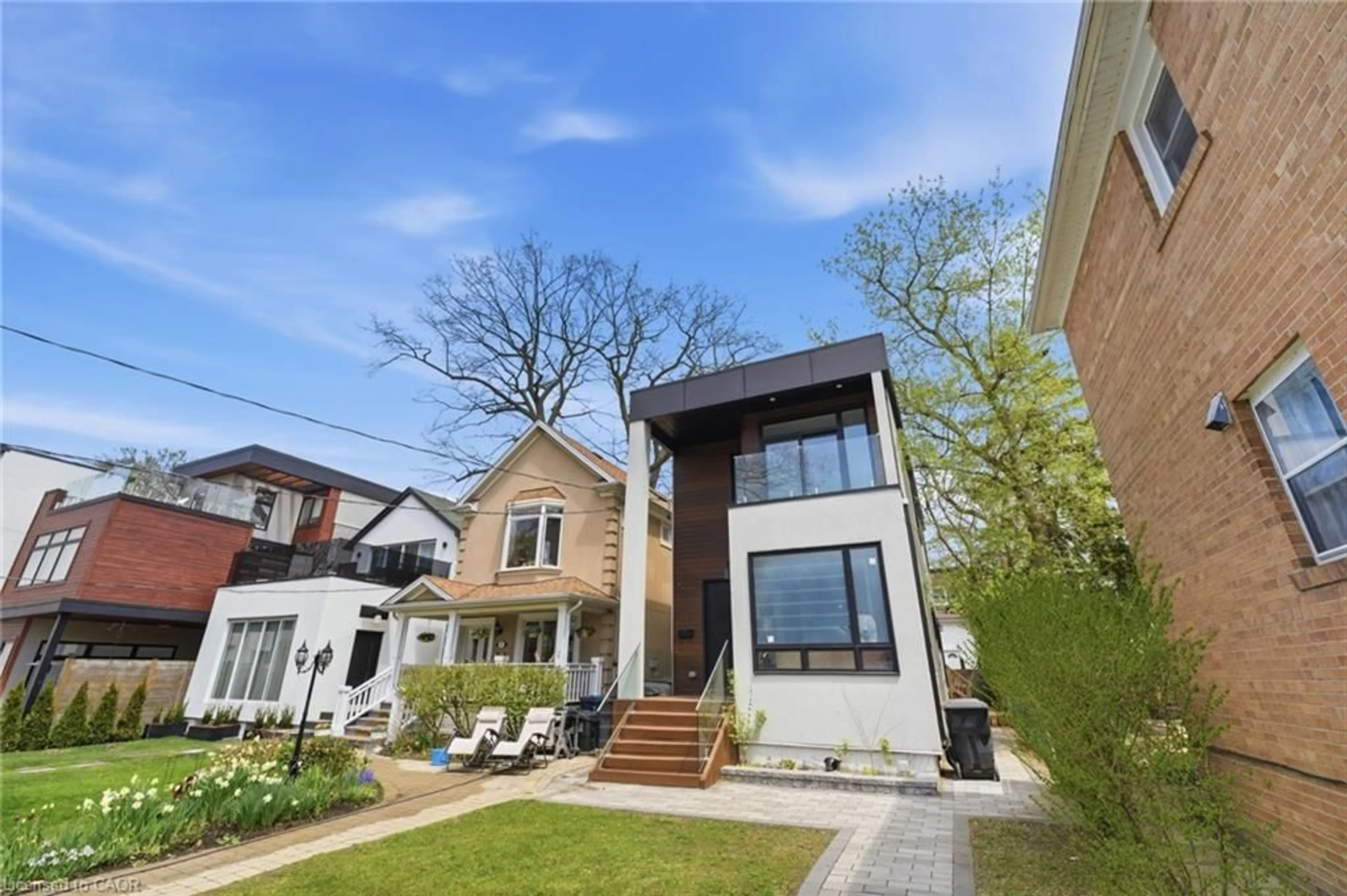 Home with brick exterior material, street for 75 Kenilworth Ave, Toronto Ontario M4L 3S4