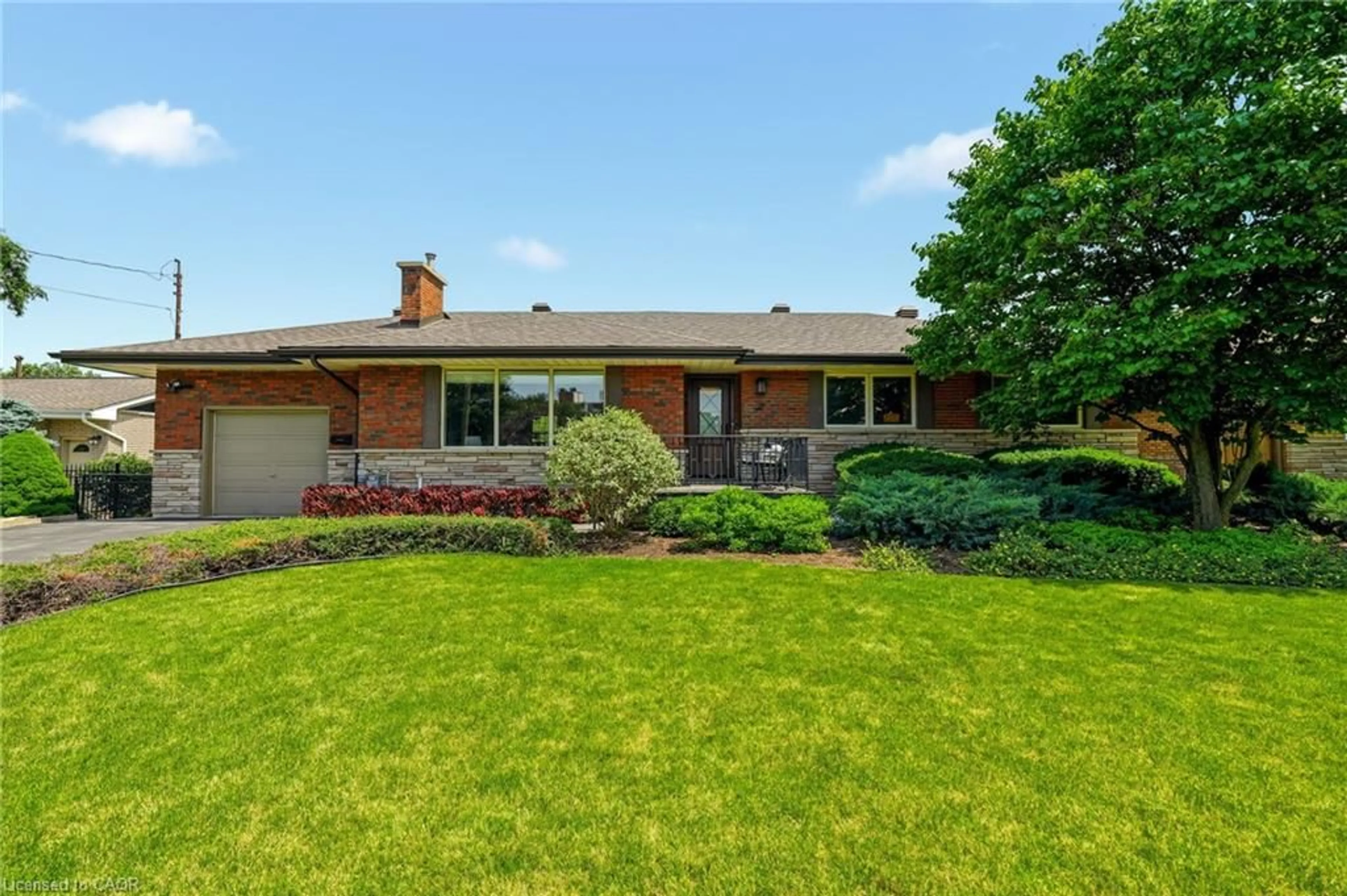 Home with brick exterior material, street for 27 Brentwood Dr, Stoney Creek Ontario L8G 2W9