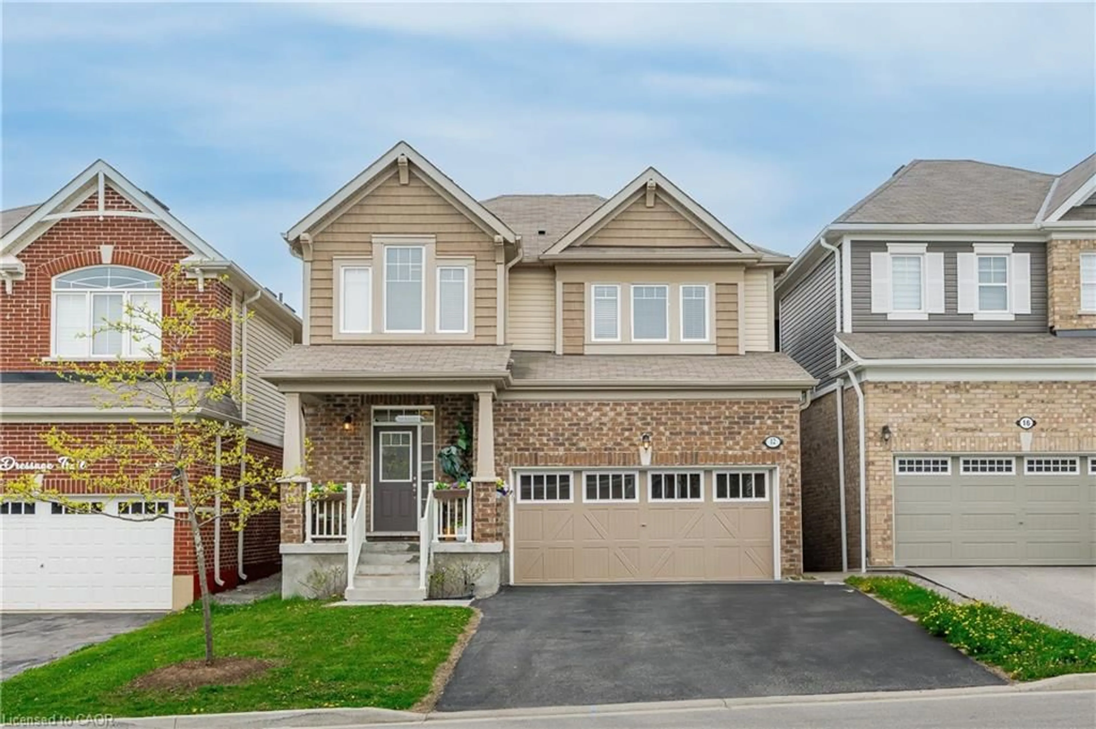 Home with brick exterior material, street for 12 Dressage Trail, Cambridge Ontario N3E 0C3