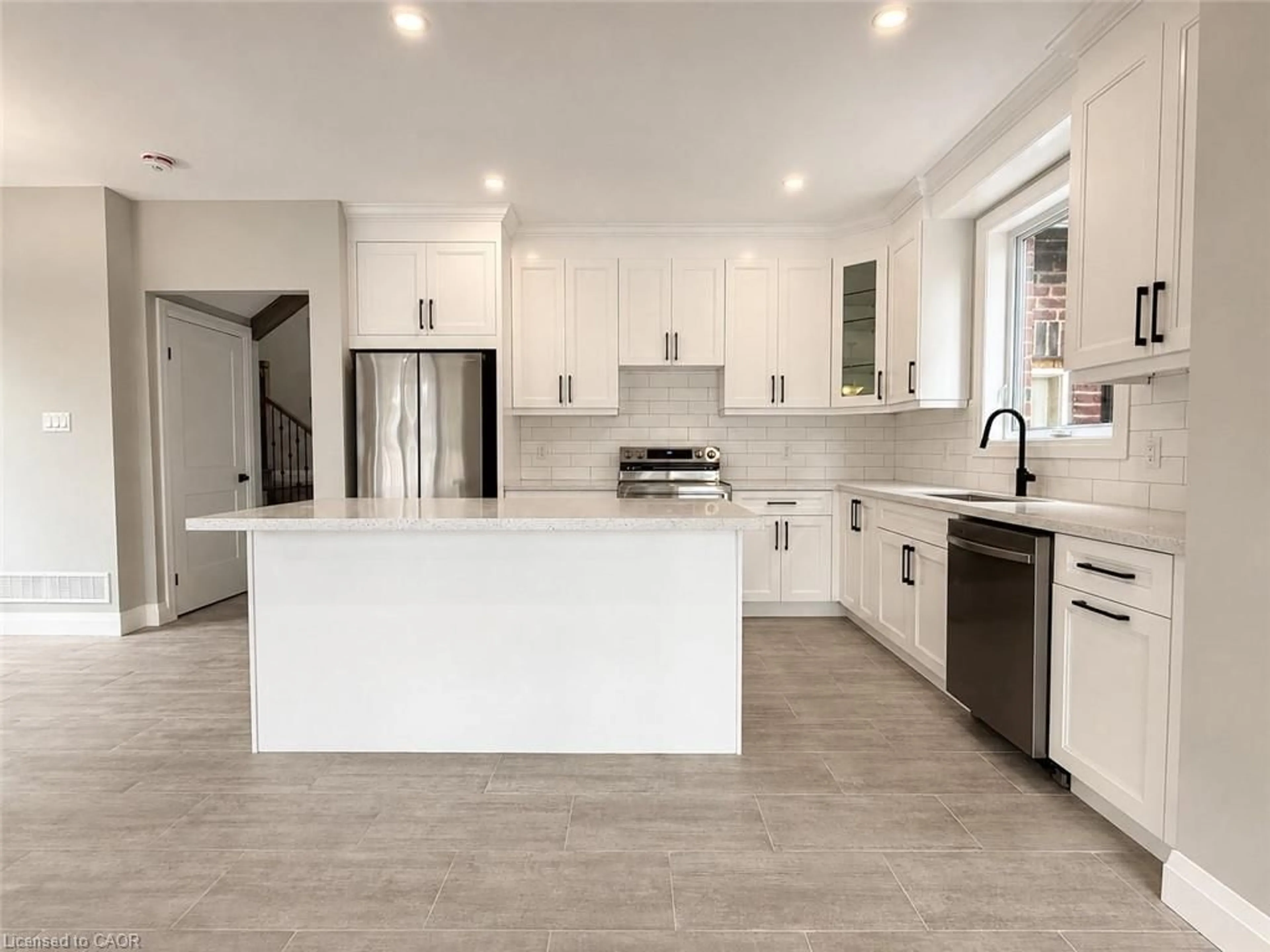 Open concept kitchen, ceramic/tile floor for 22-A Alpine Ave, Stoney Creek Ontario L9A 1A5