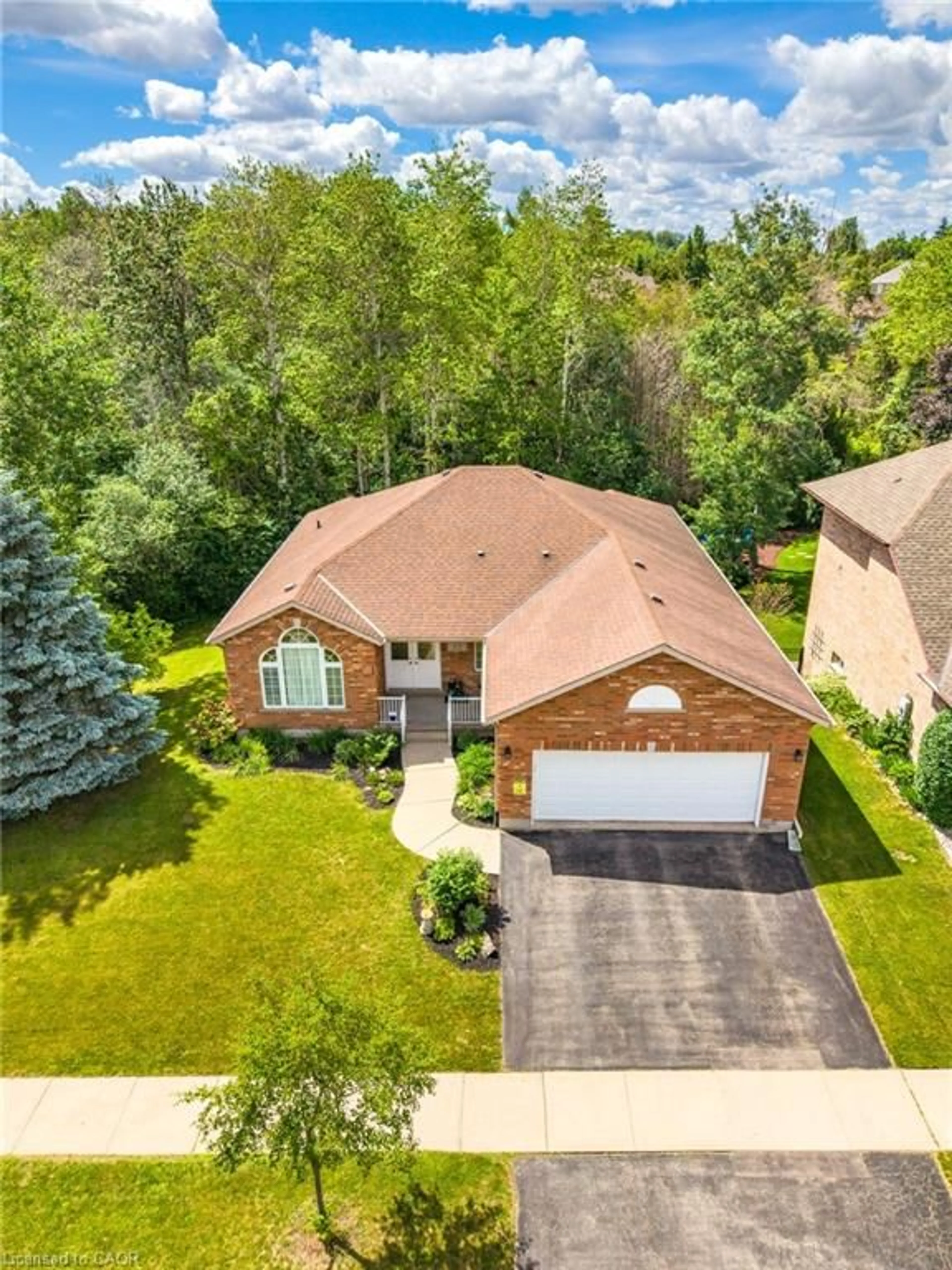 A pic from outside/outdoor area/front of a property/back of a property/a pic from drone, street for 63 Daimler Dr, Kitchener Ontario N2A 3W3