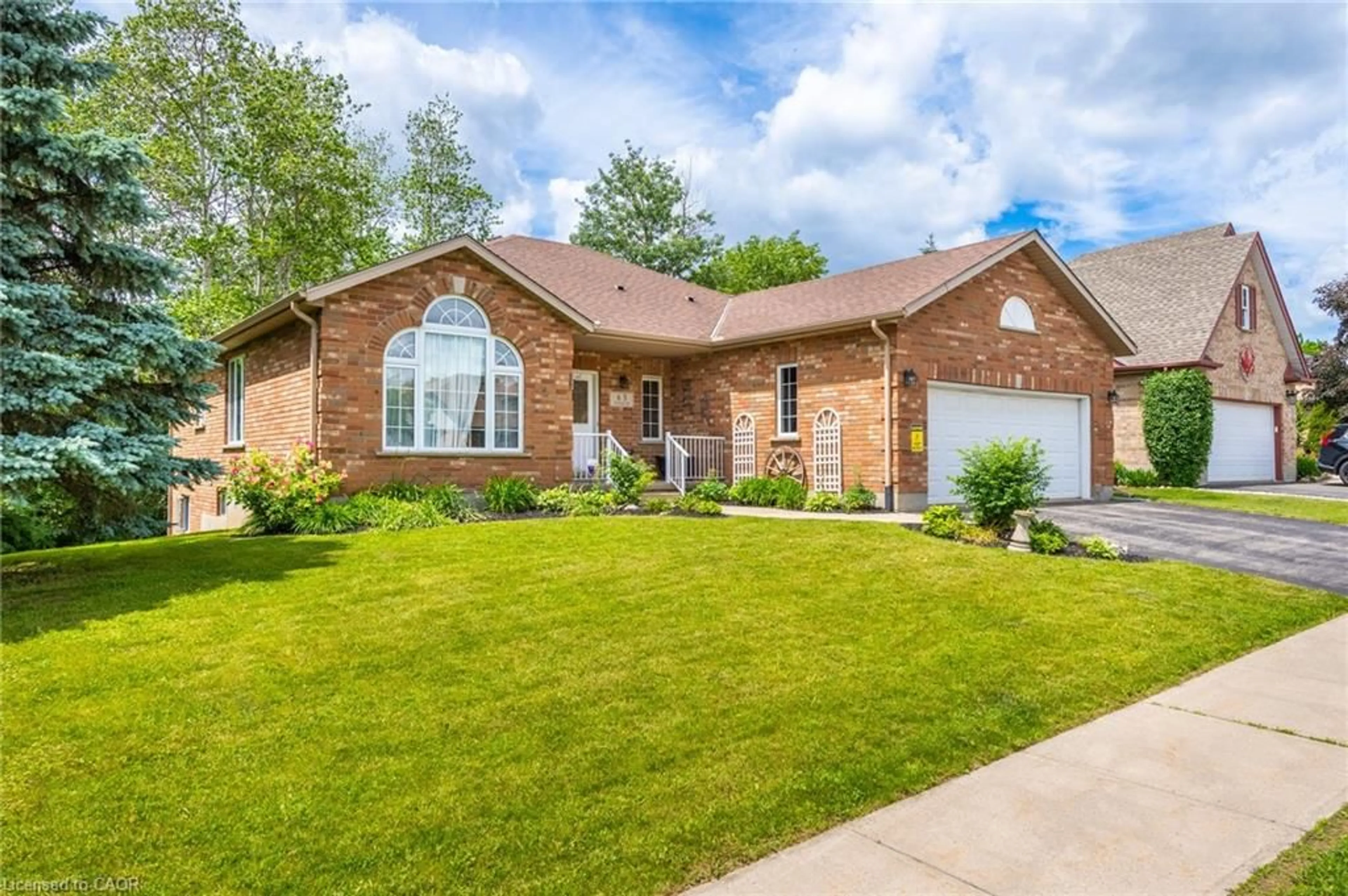 Home with brick exterior material, street for 63 Daimler Dr, Kitchener Ontario N2A 3W3