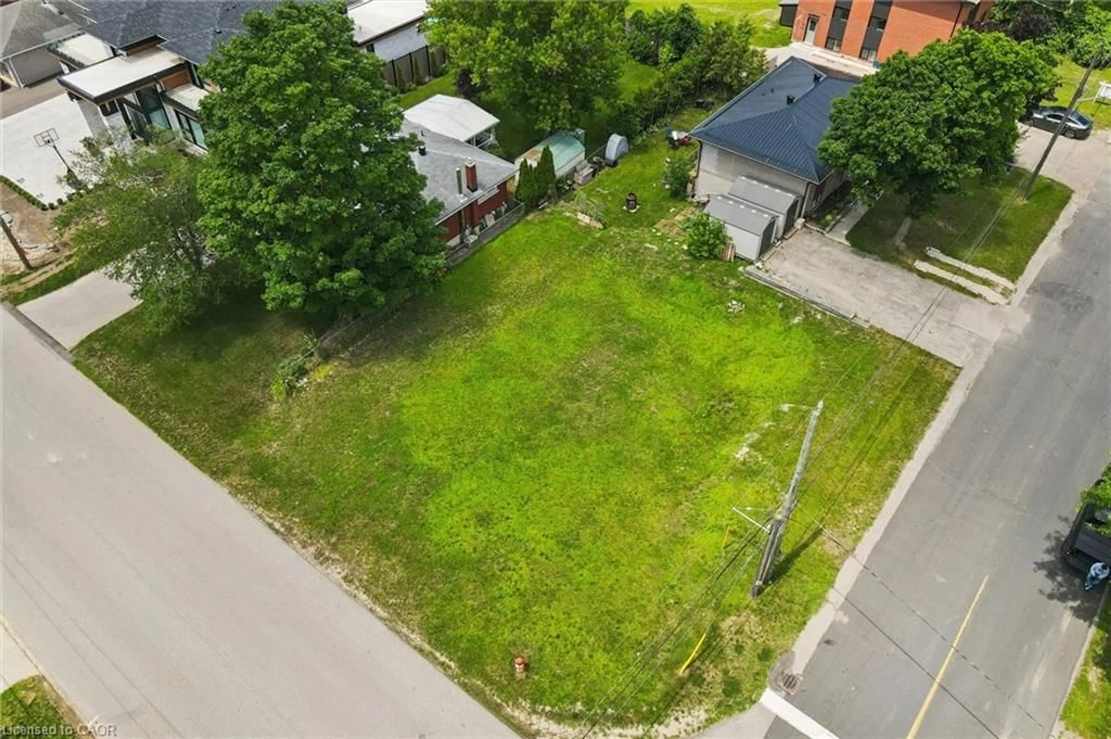 A pic from outside/outdoor area/front of a property/back of a property/a pic from drone, street for 46 Daniel Ave, Kitchener Ontario N2K 1E9