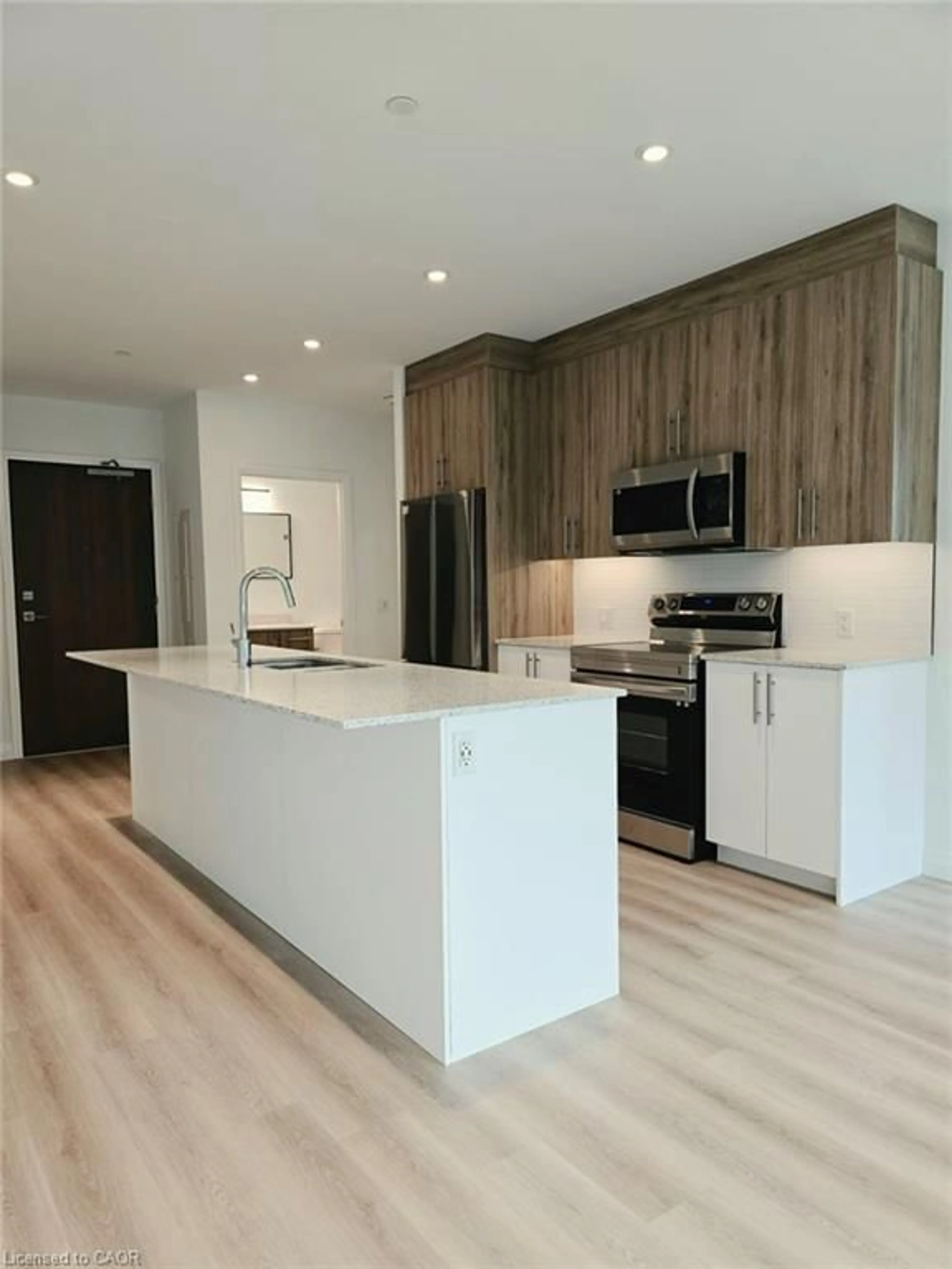 Open concept kitchen, wood/laminate floor for 525 New Dundee Rd #226, Kitchener Ontario N2P 2L1