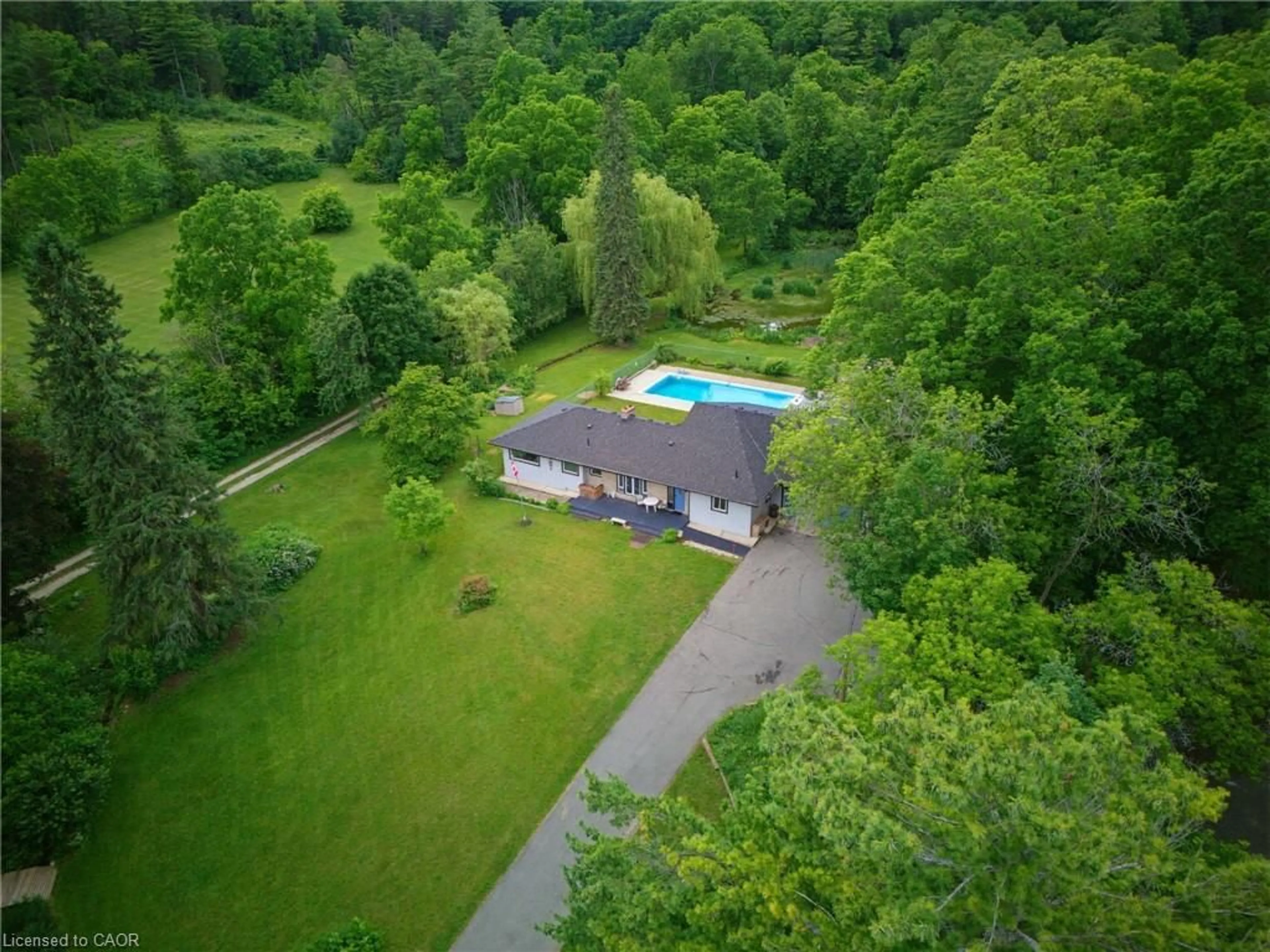 A pic from outside/outdoor area/front of a property/back of a property/a pic from drone, water/lake/river/ocean view for 1394 West River Rd, North Dumfries Ontario N1R 5S5
