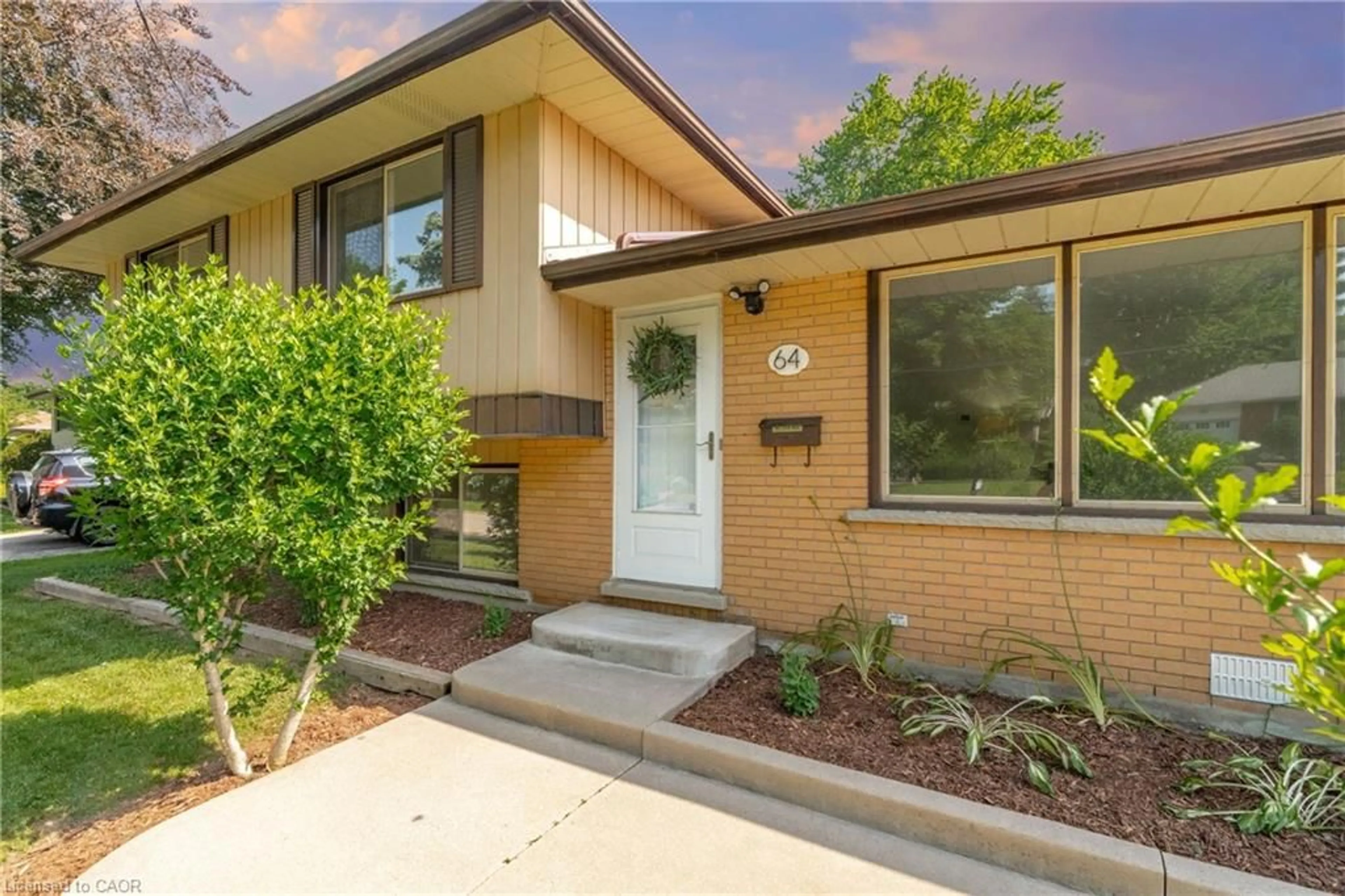 Home with brick exterior material, street for 64 Warren Rd, Kitchener Ontario N2M 4T4