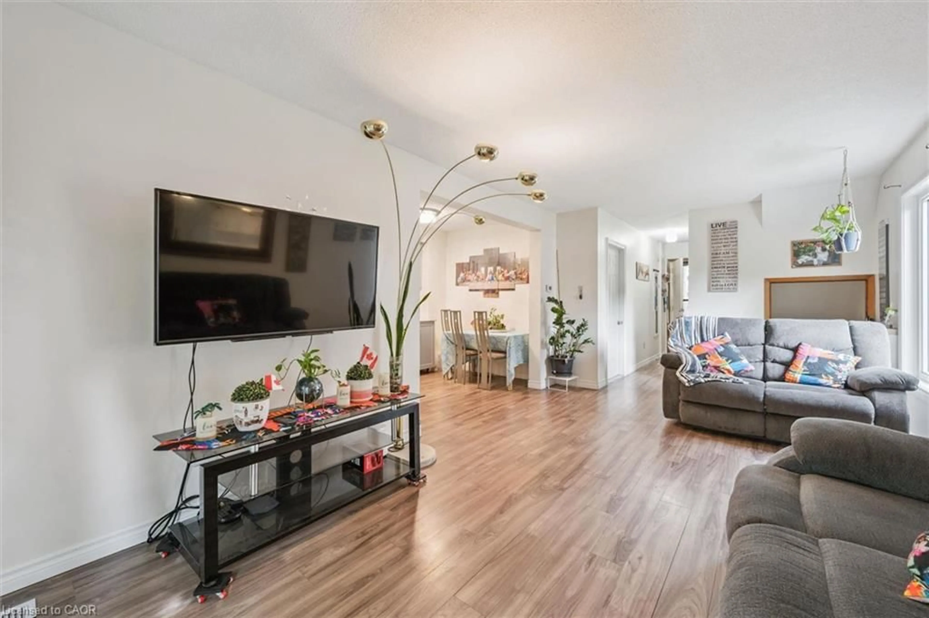 Living room with furniture, unknown for 46 Cedarwoods Cres #53, Kitchener Ontario N2C 2L7