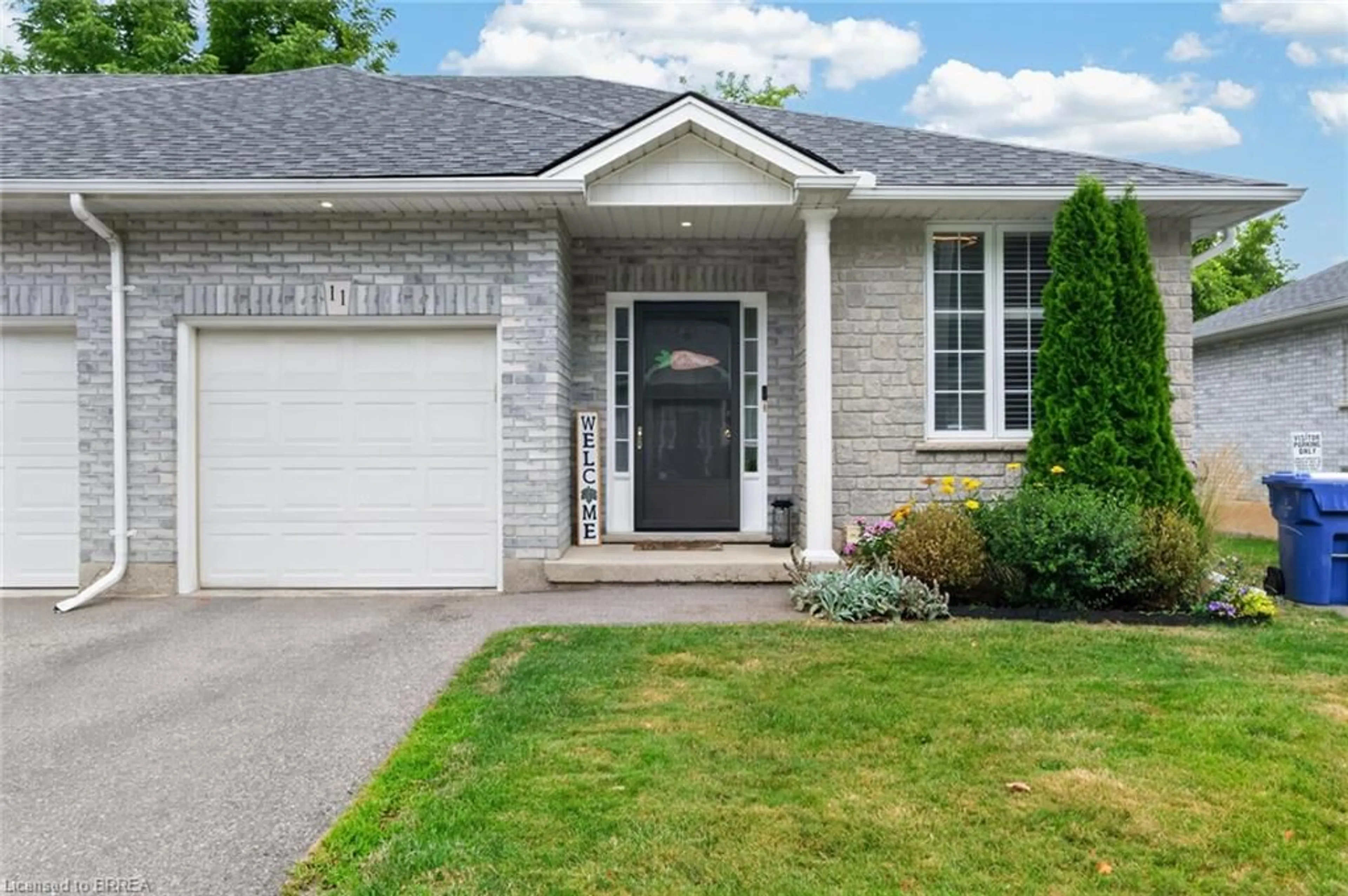 Home with brick exterior material, street for 219 Shellard Lane #11, Brantford Ontario N3T 0B8
