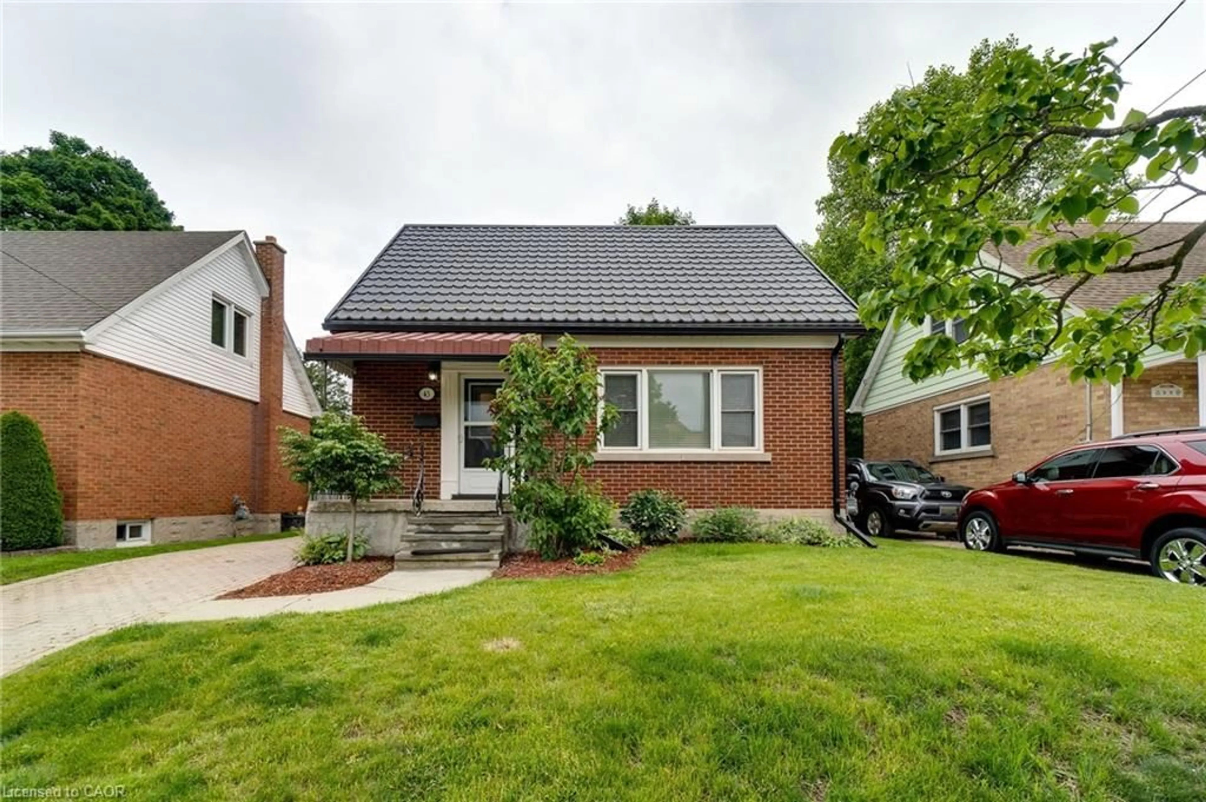 Home with brick exterior material, street for 43 Brick St, Kitchener Ontario N2H 3L2