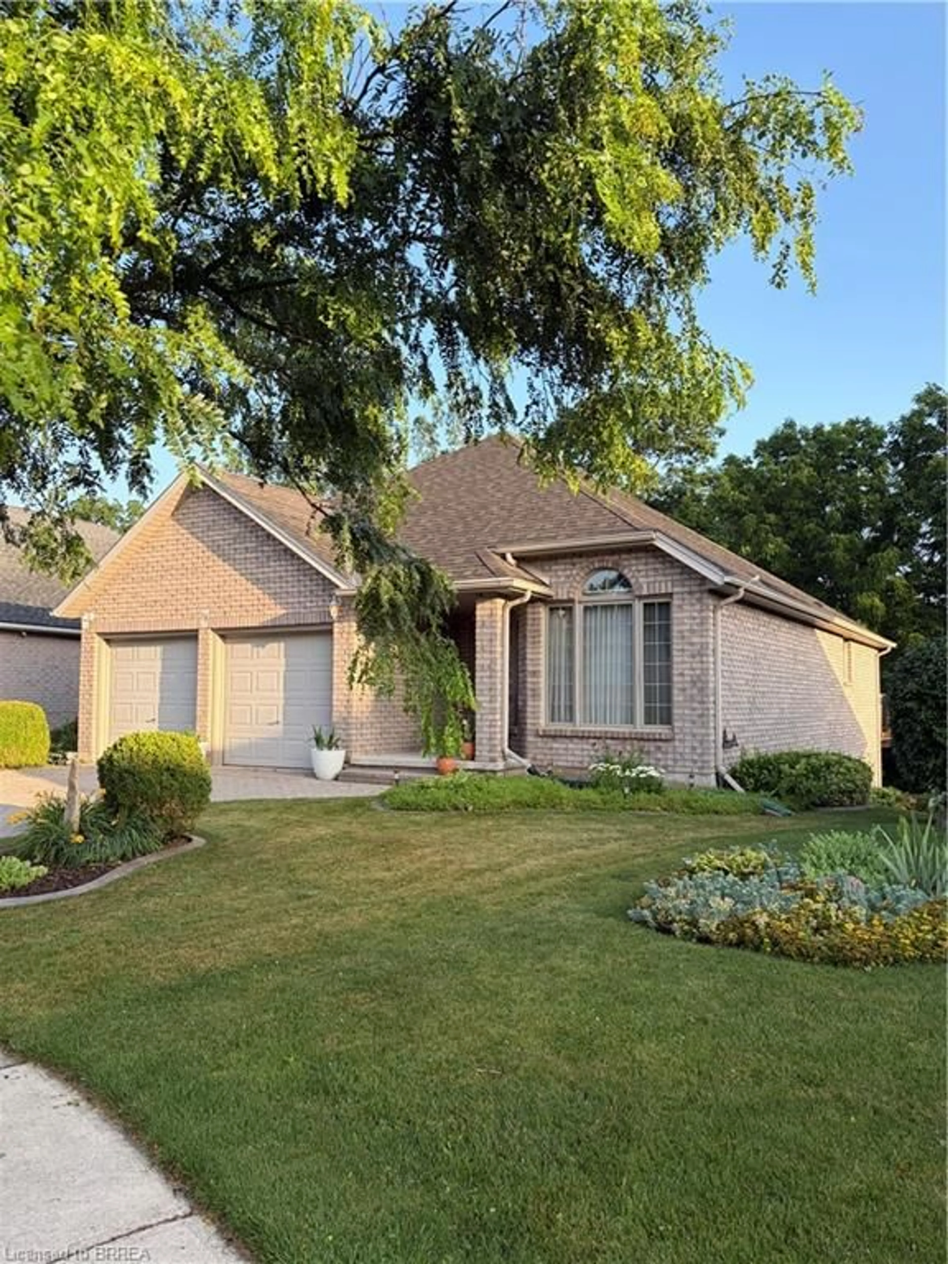 Home with brick exterior material, street for 18 Maich Cres, Brantford Ontario N3T 6P1