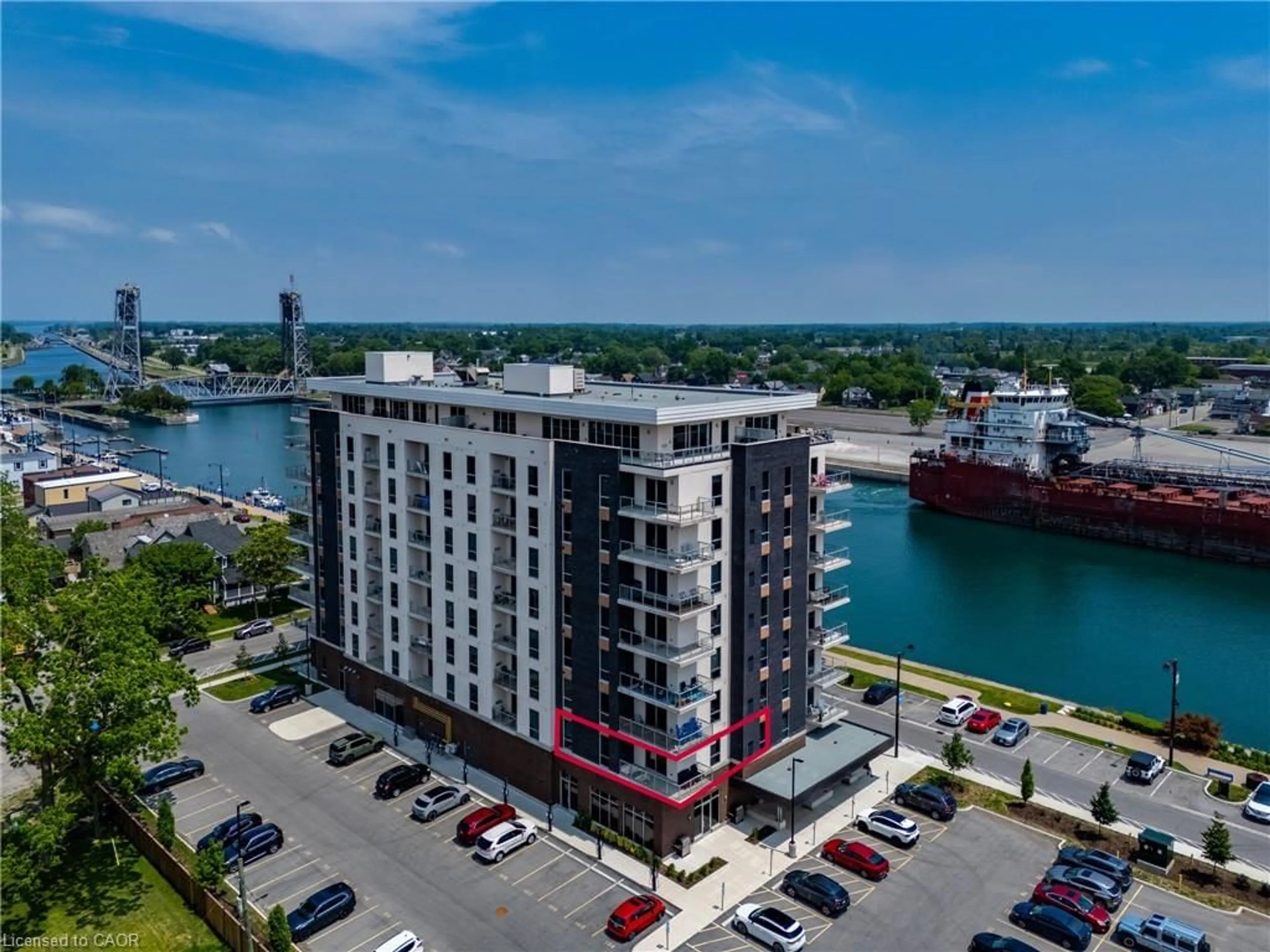 A pic from outside/outdoor area/front of a property/back of a property/a pic from drone, water/lake/river/ocean view for 118 West St #201, Port Colborne Ontario L3K 0B9