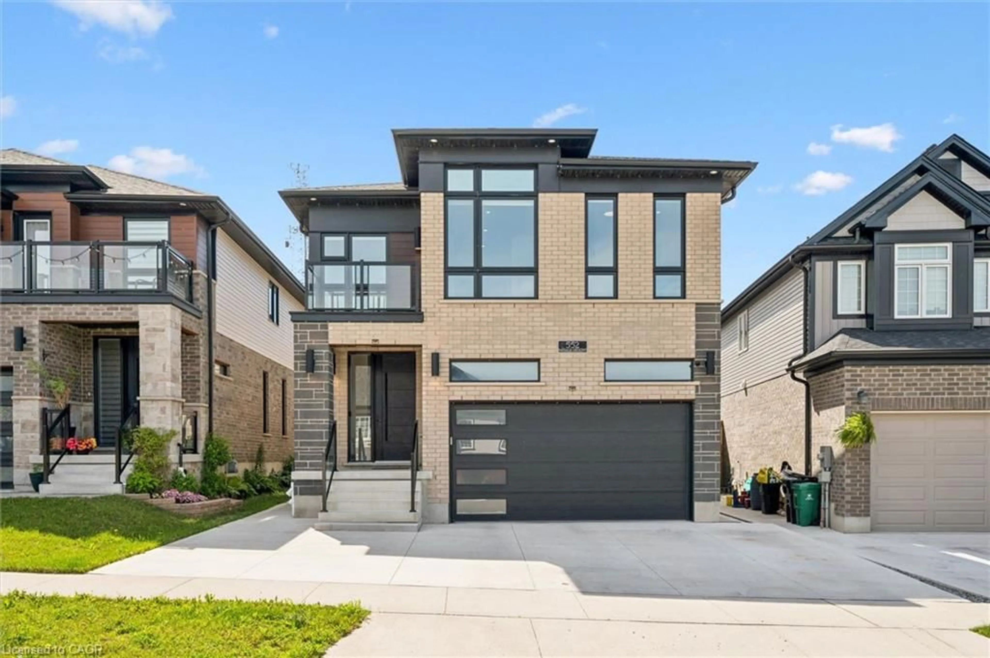Home with brick exterior material, street for 552 Nathalie Cres, Kitchener Ontario N2E 0H9