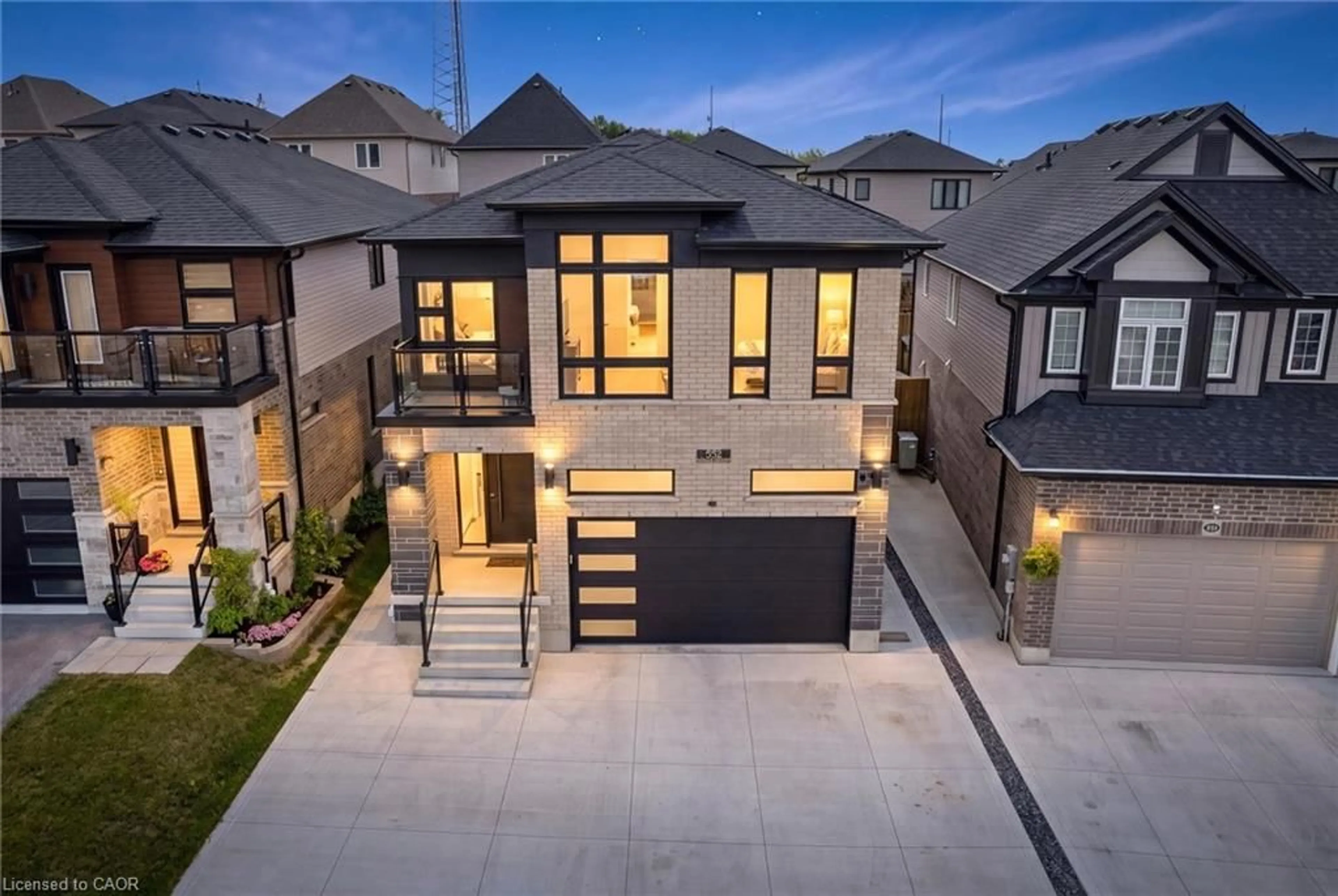 Home with brick exterior material, street for 552 Nathalie Cres, Kitchener Ontario N2E 0H9