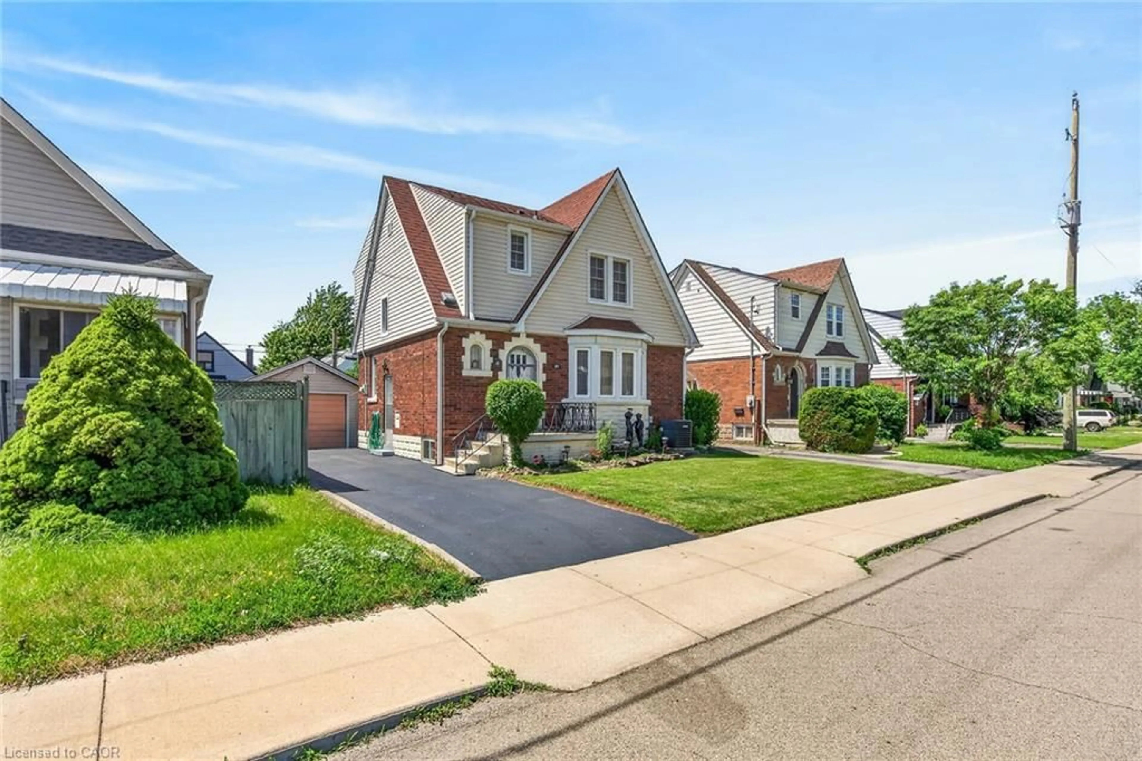 Home with brick exterior material, street for 20 Cameron Ave, Hamilton Ontario L8K 2W8