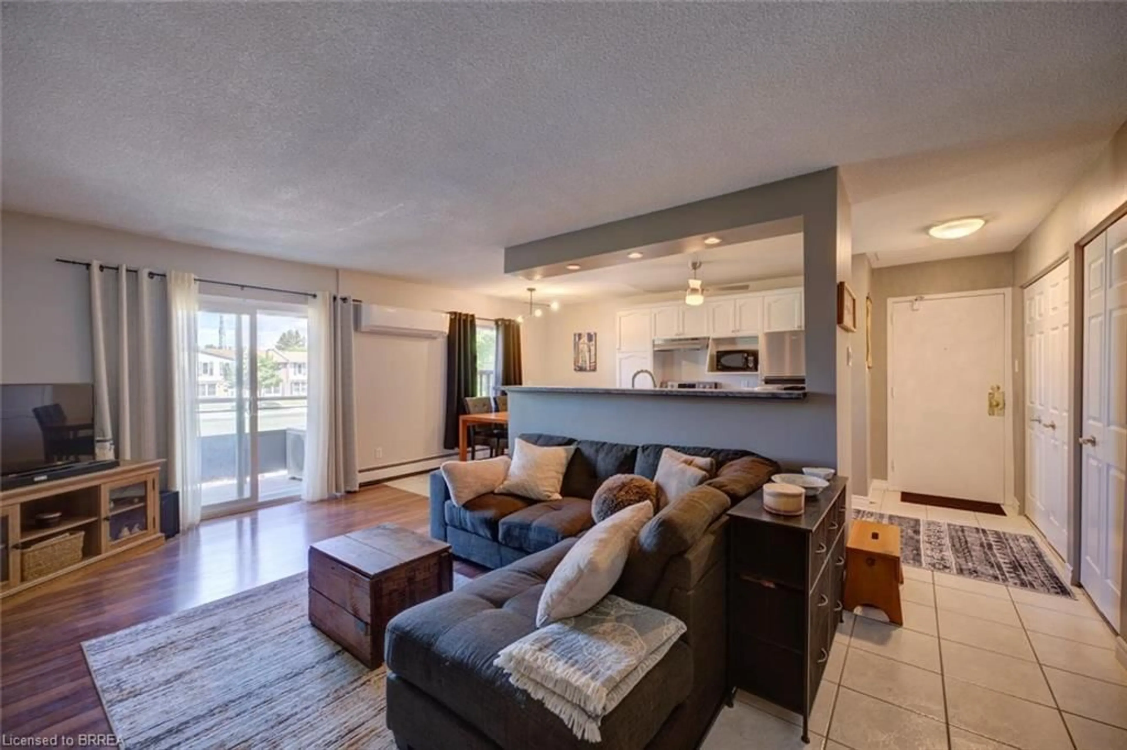Living room with furniture, unknown for 608 Grey St #18, Brantford Ontario N3S 4Y4