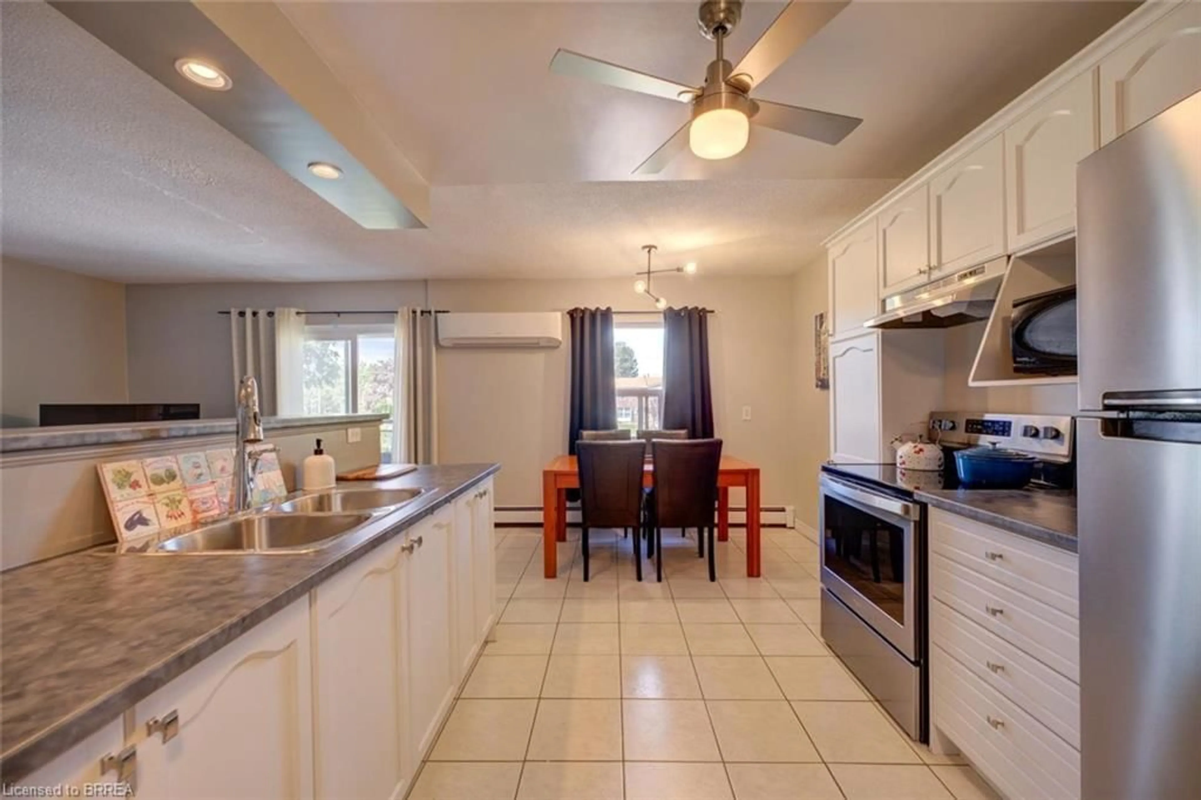 Open concept kitchen, ceramic/tile floor for 608 Grey St #18, Brantford Ontario N3S 4Y4