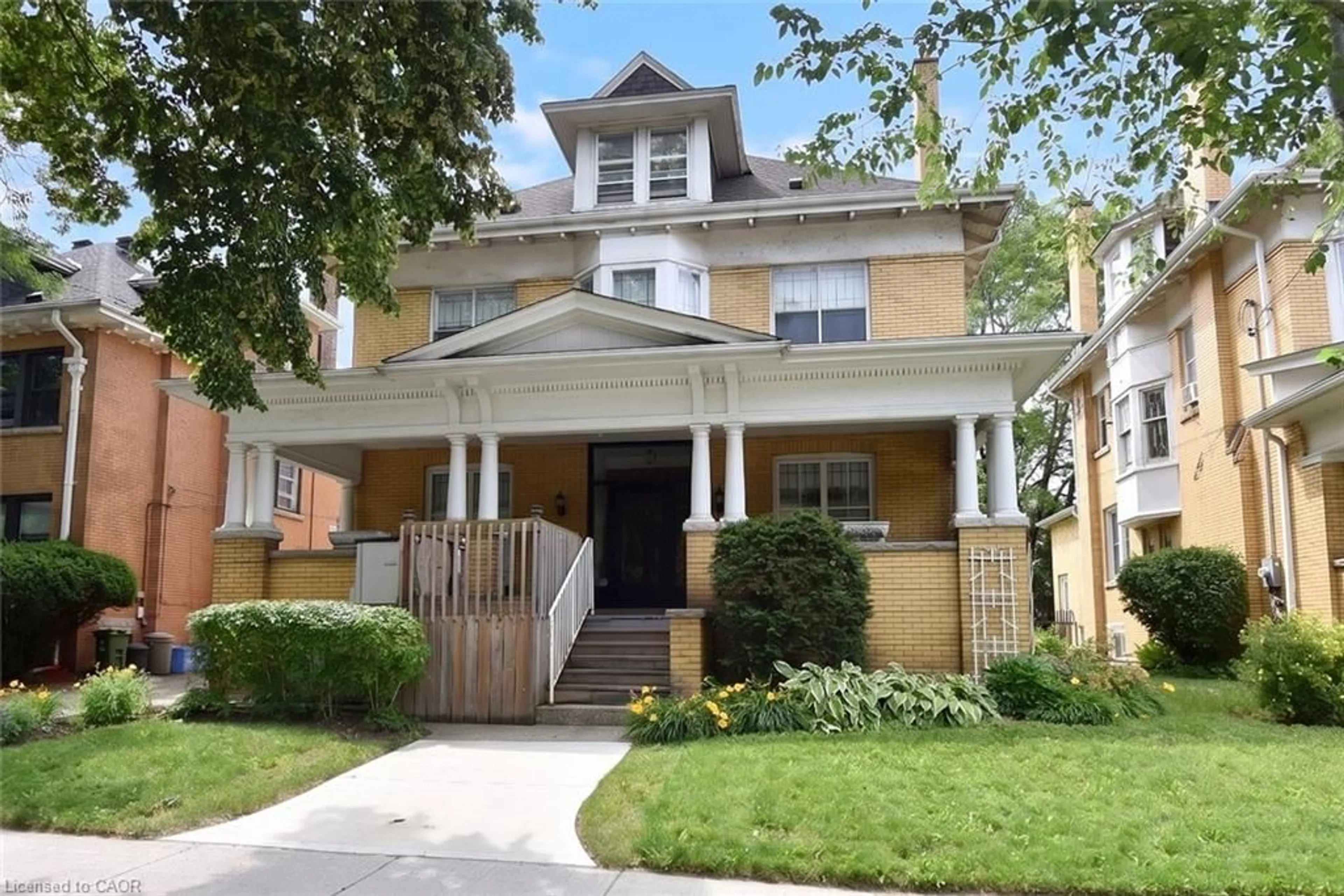 Home with brick exterior material, street for 68 Sherman Ave, Hamilton Ontario L8M 2P7