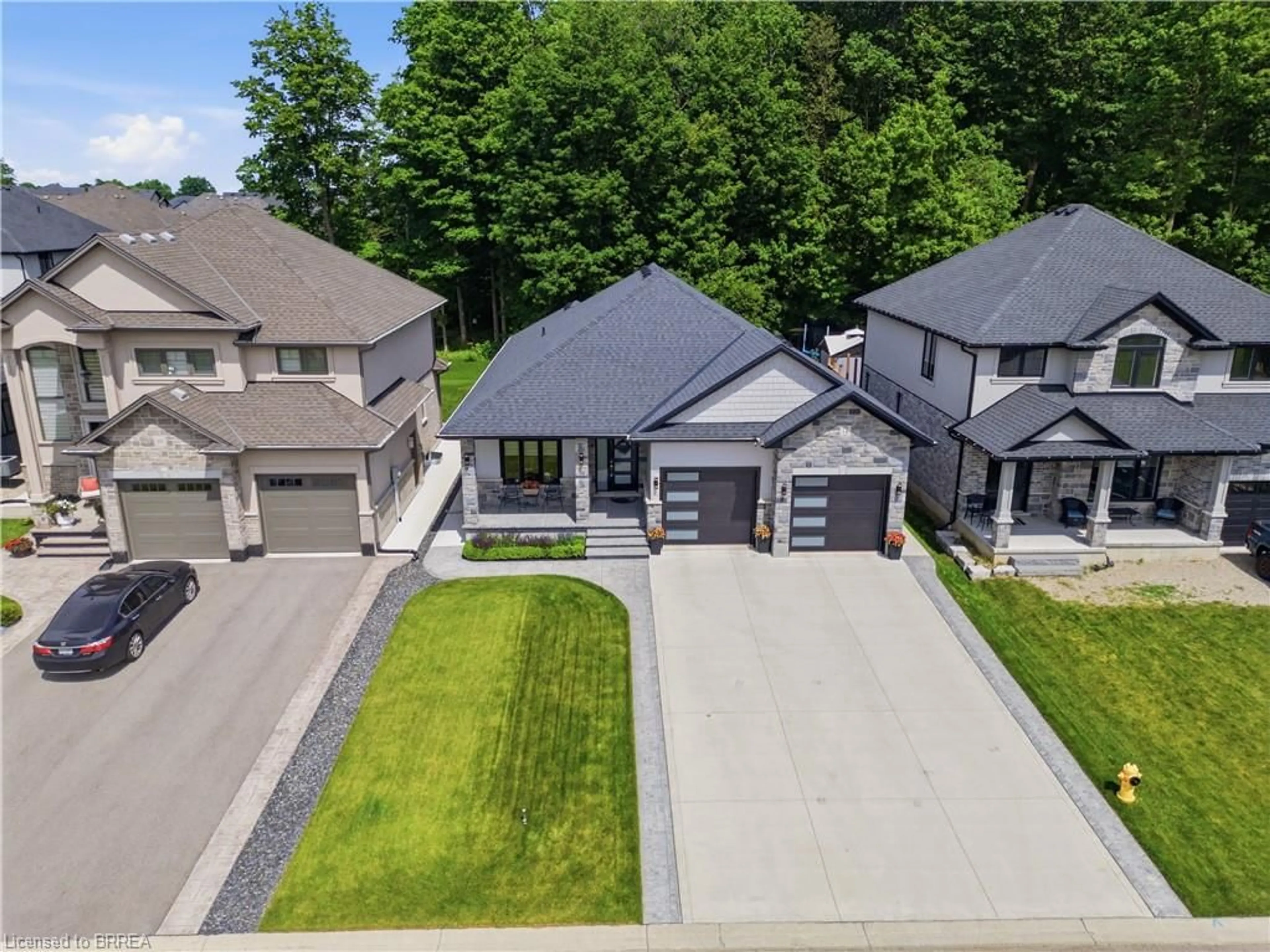 A pic from outside/outdoor area/front of a property/back of a property/a pic from drone, street for 14 Windywood Lane, Norwich Ontario N0J 1P0