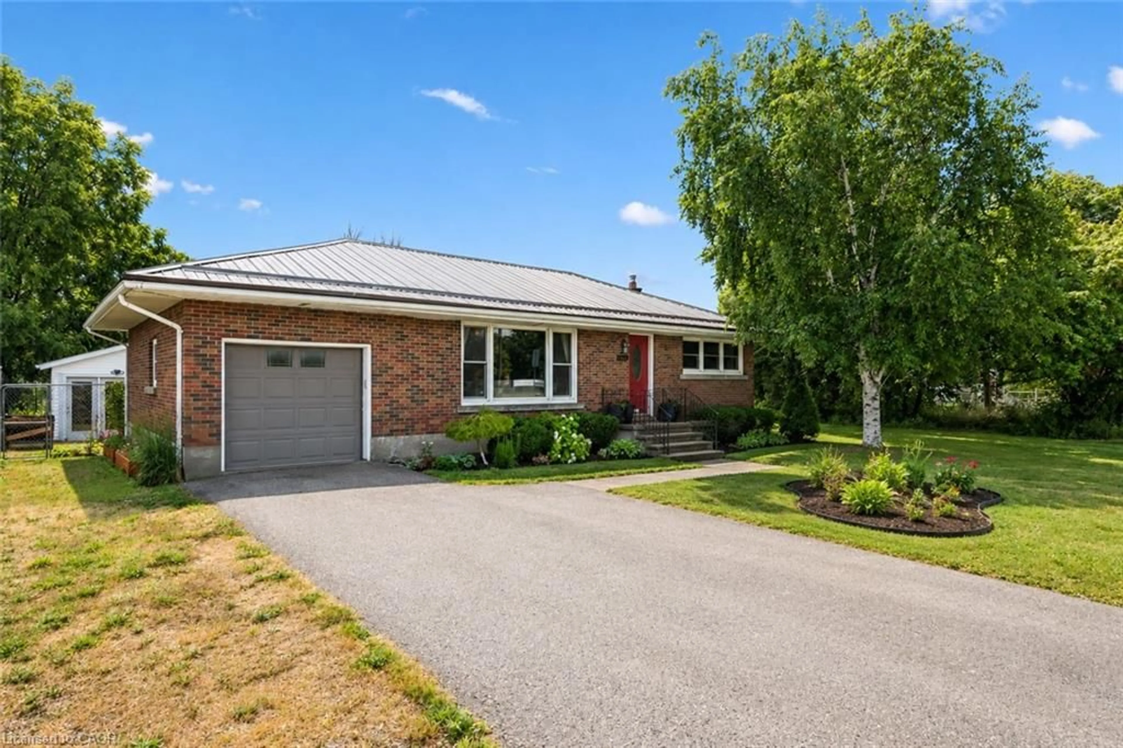 Home with brick exterior material, street for 1065 Erie St, Stratford Ontario N5A 6S4