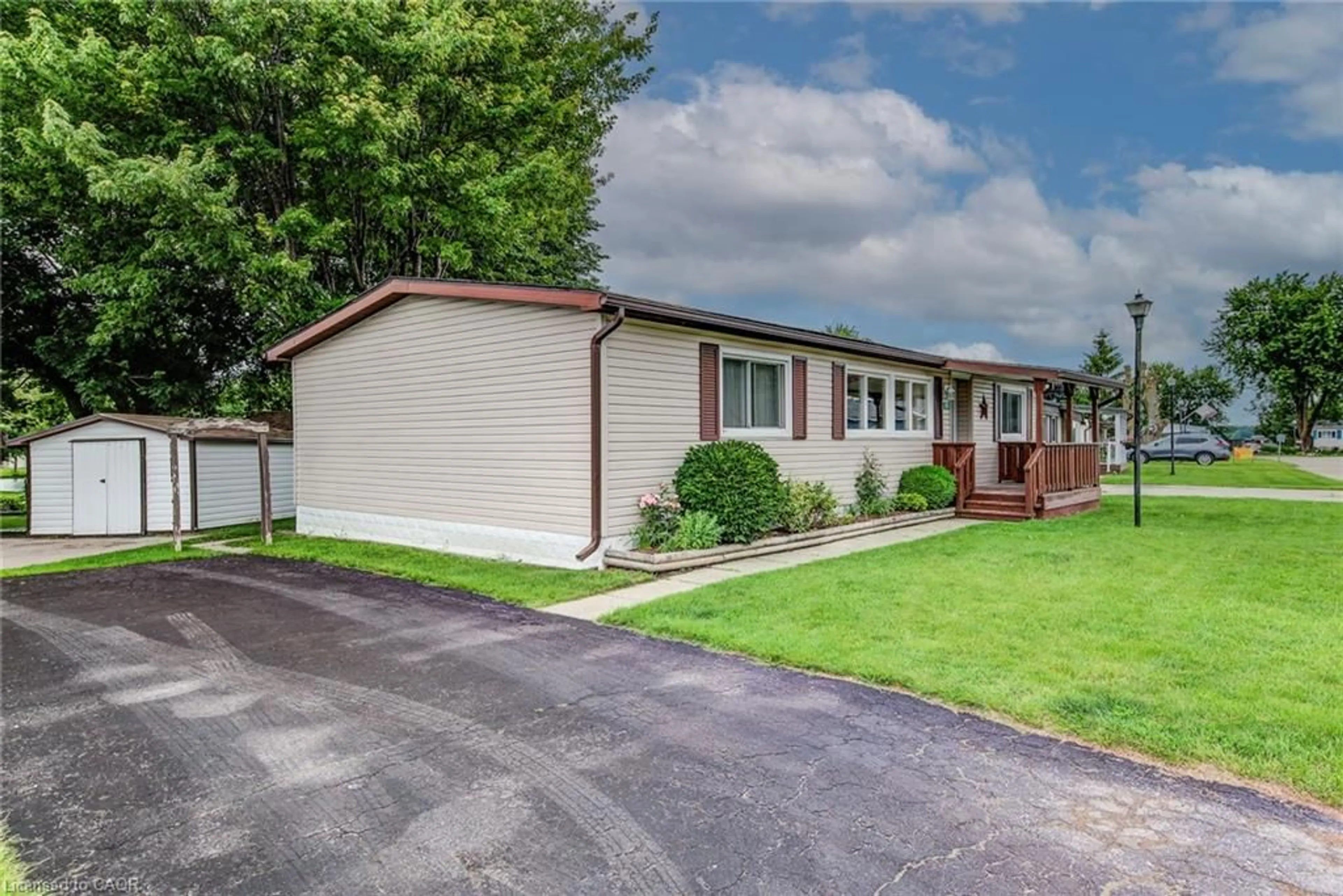 Home with vinyl exterior material, street for 63 Fairview Cres, Listowel Ontario N4W 3G8