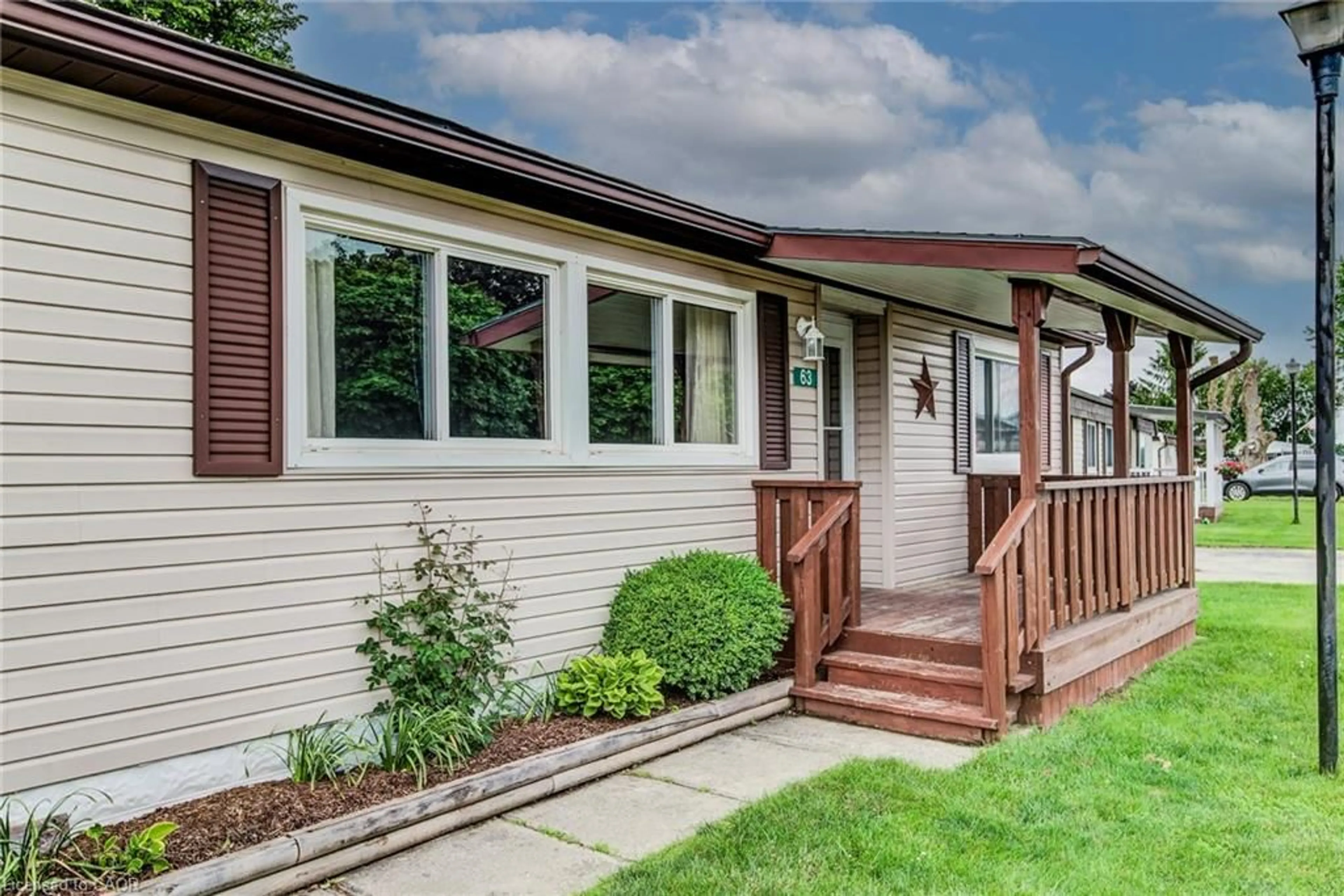 Home with vinyl exterior material, street for 63 Fairview Cres, Listowel Ontario N4W 3G8