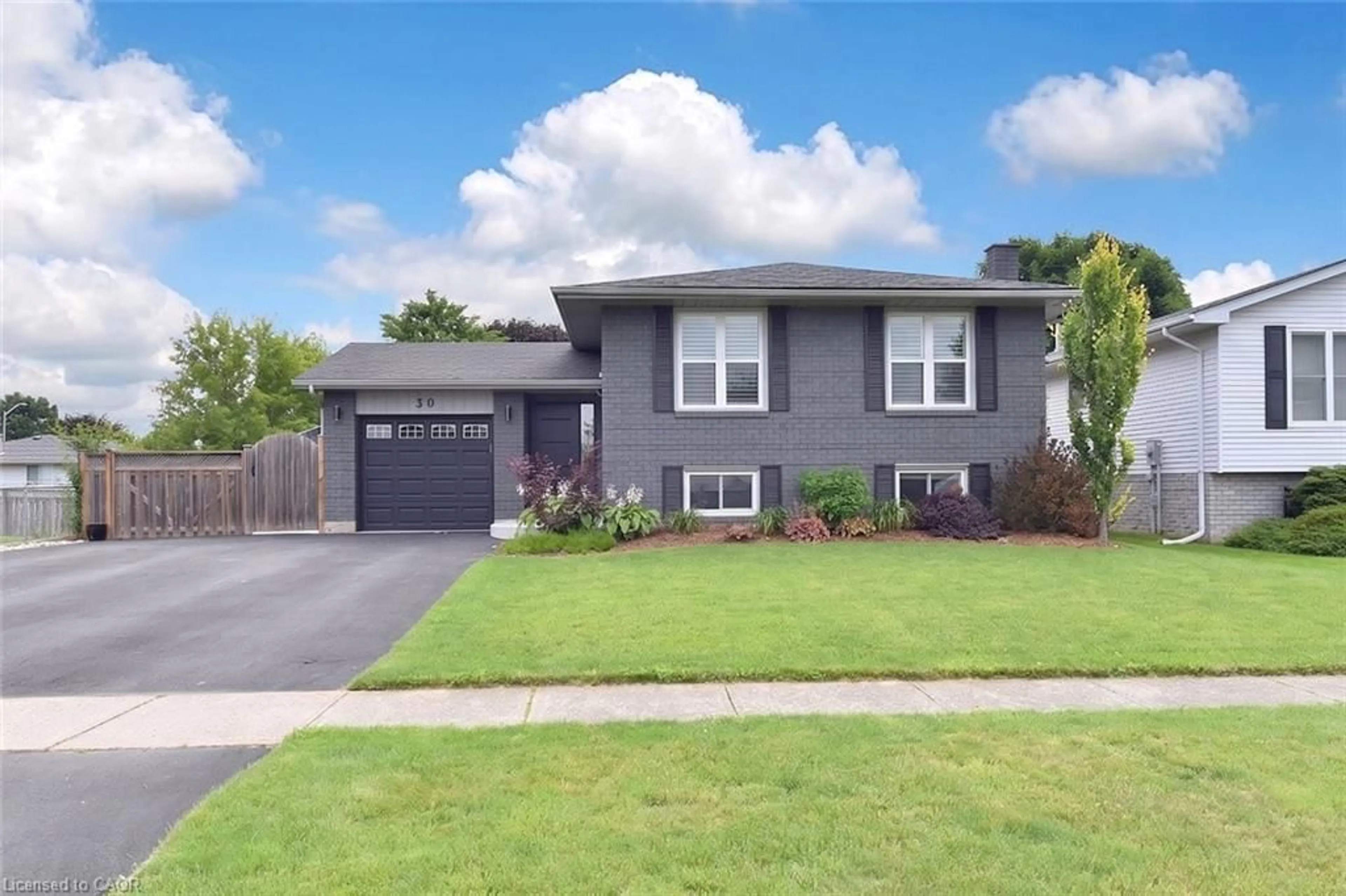 Home with vinyl exterior material, street for 30 Scott St, St. George Ontario N0E 1N0