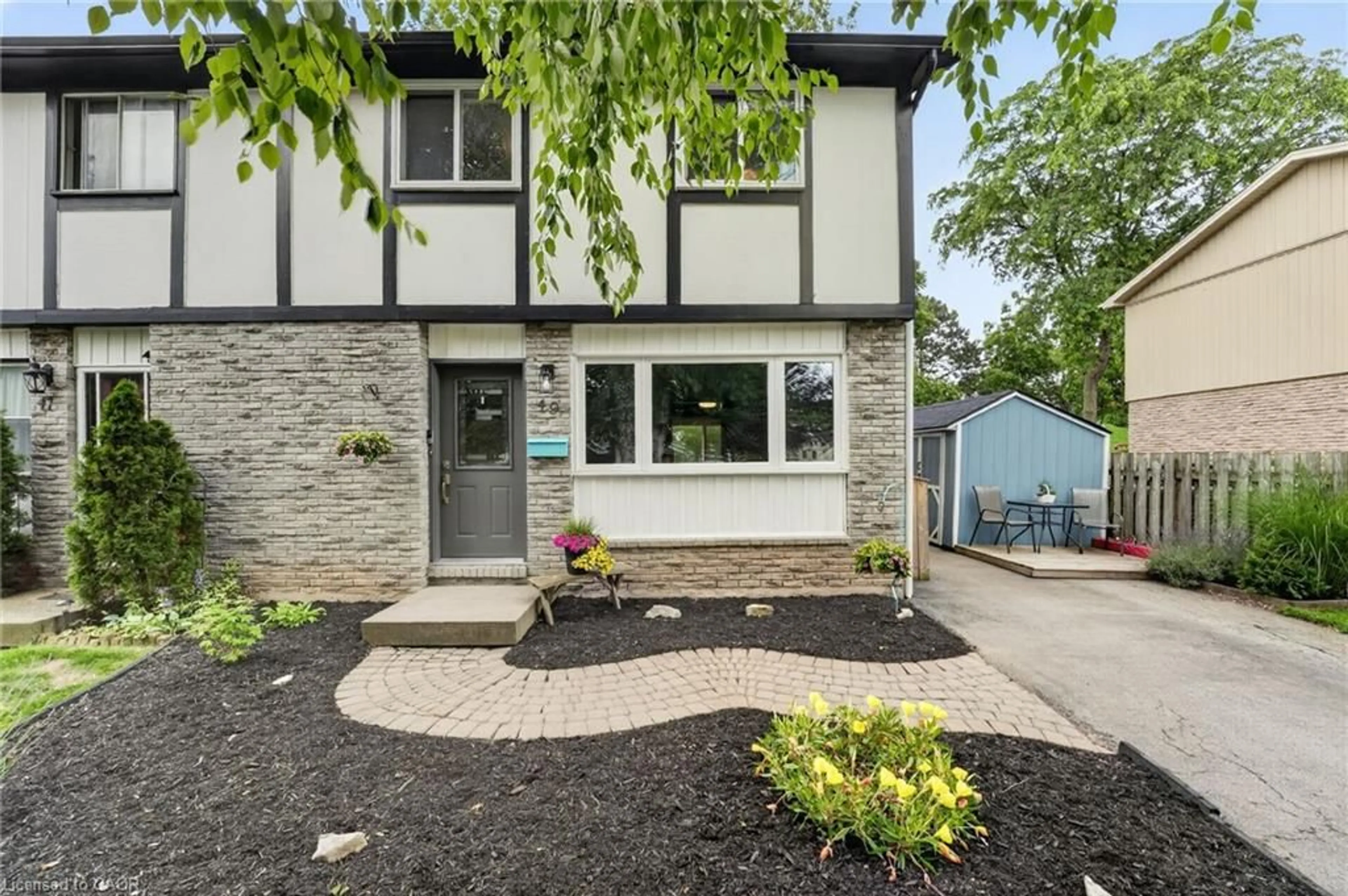 Home with brick exterior material, street for 49 Birchpark Dr, Grimsby Ontario L3M 4M9