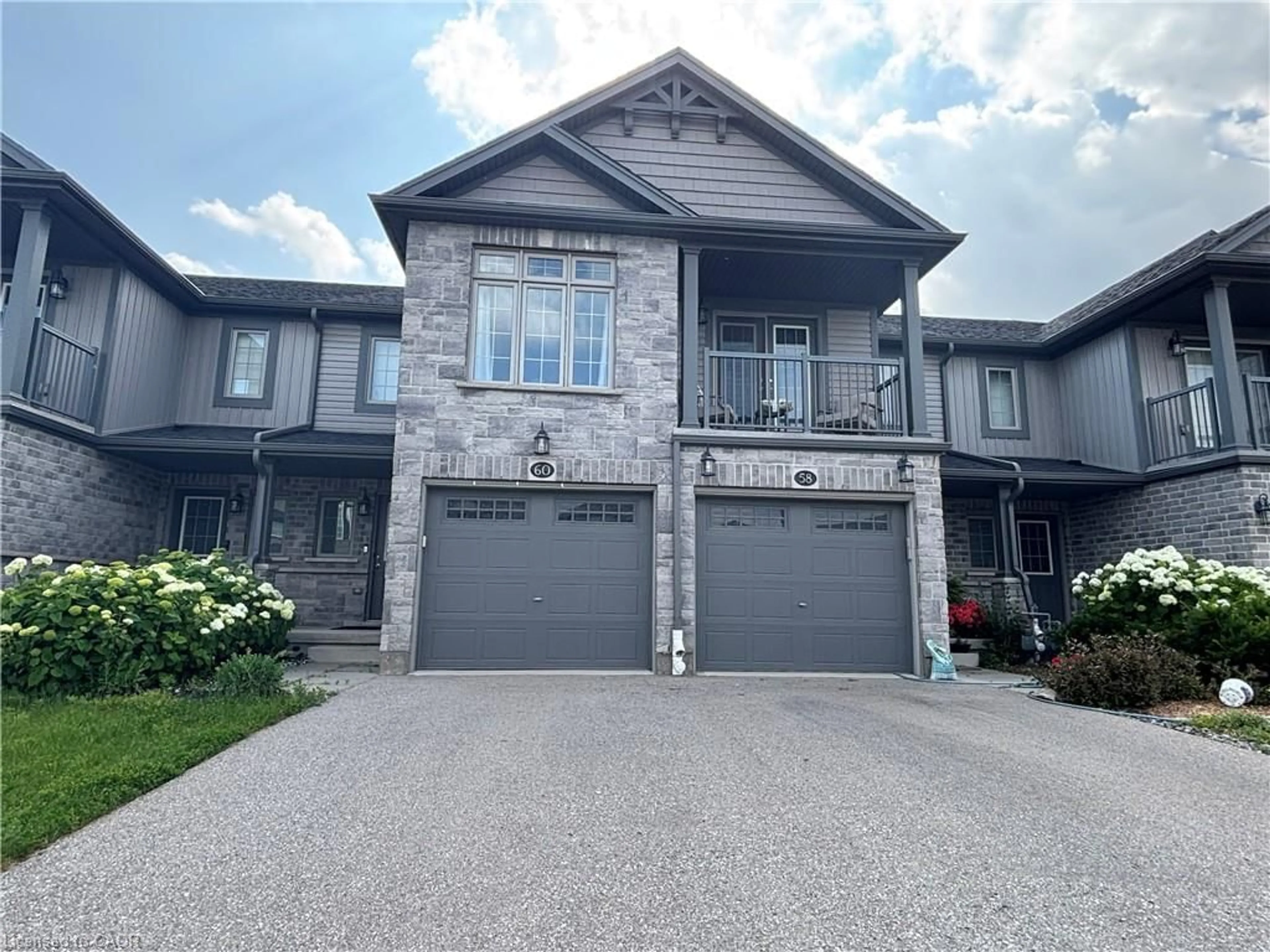 Home with brick exterior material, street for 60 Netherwood Rd, Kitchener Ontario N2P 0A4