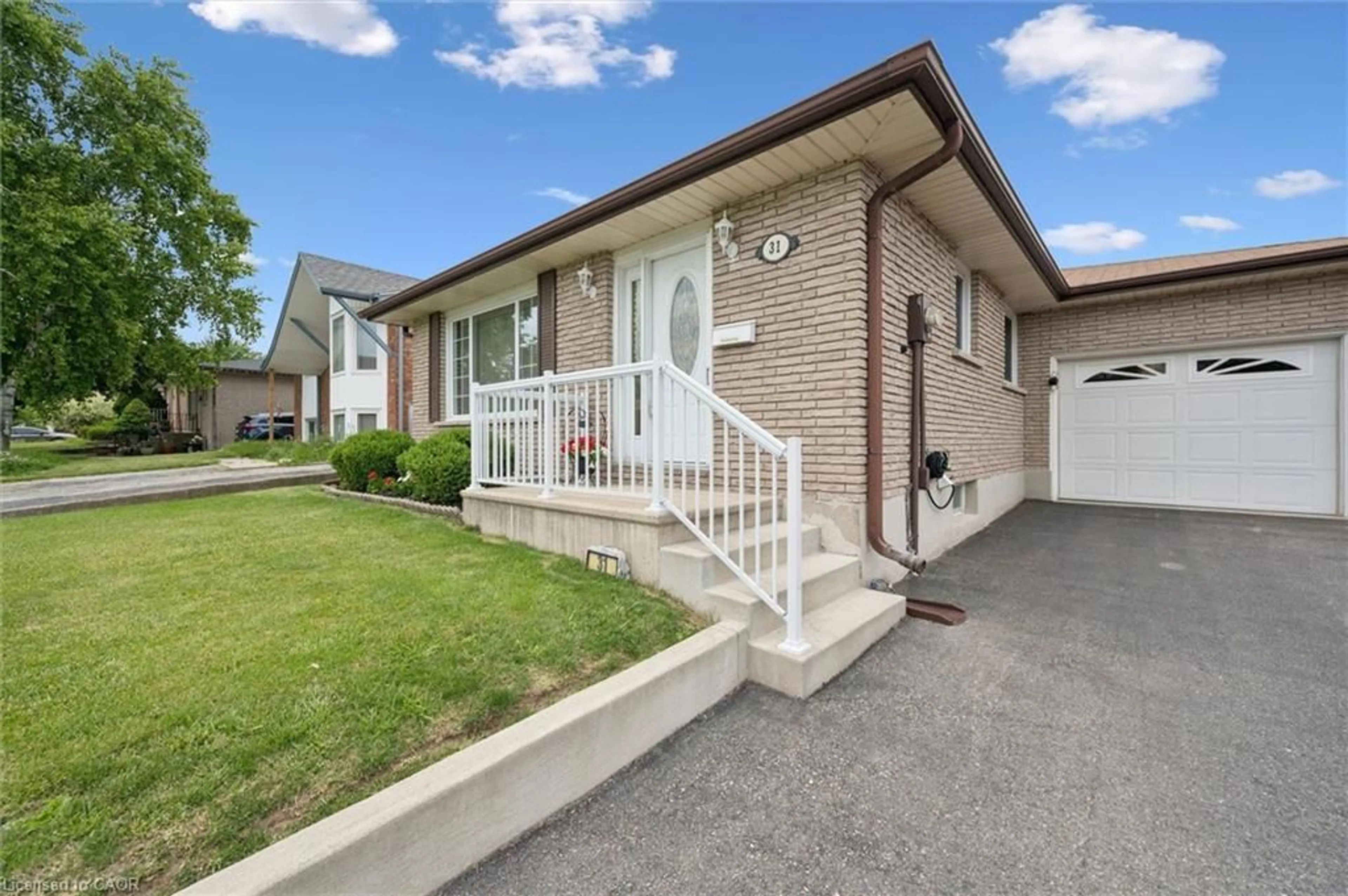 Home with brick exterior material, street for 31 Faial Rd, Cambridge Ontario N1R 6Y1