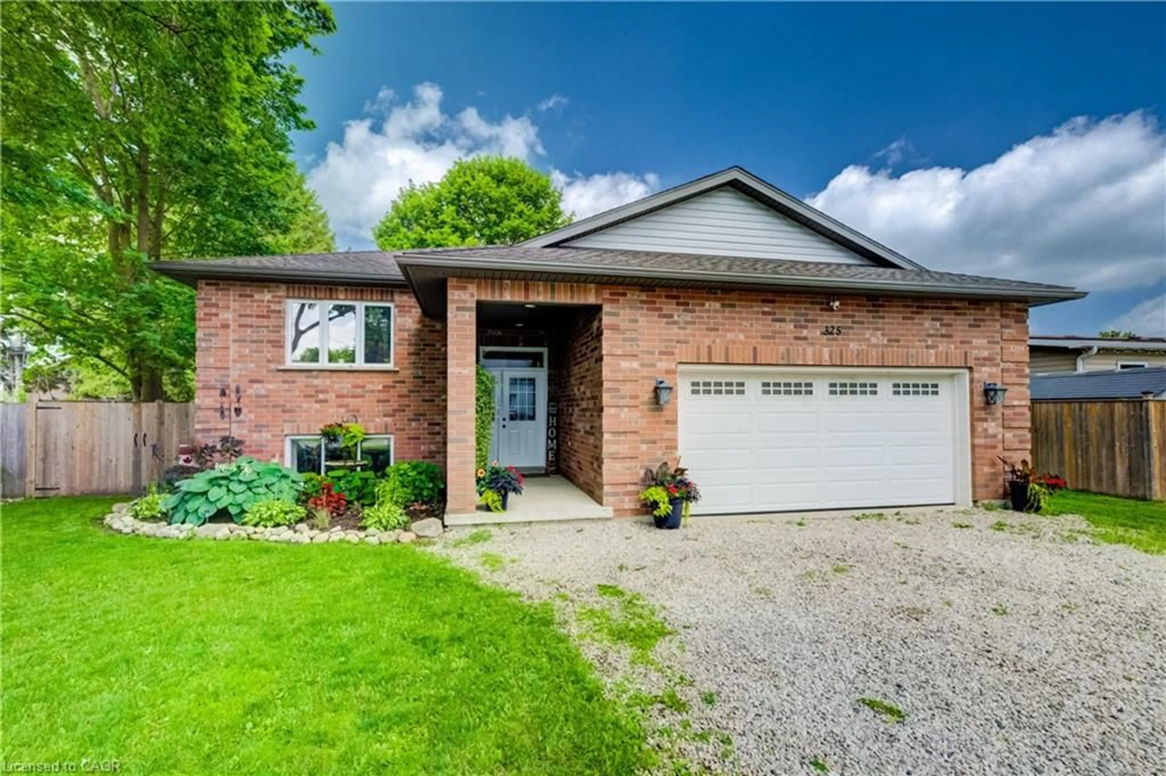 Home with brick exterior material, street for 325 Mill St, Palmerston Ontario N0G 2P0