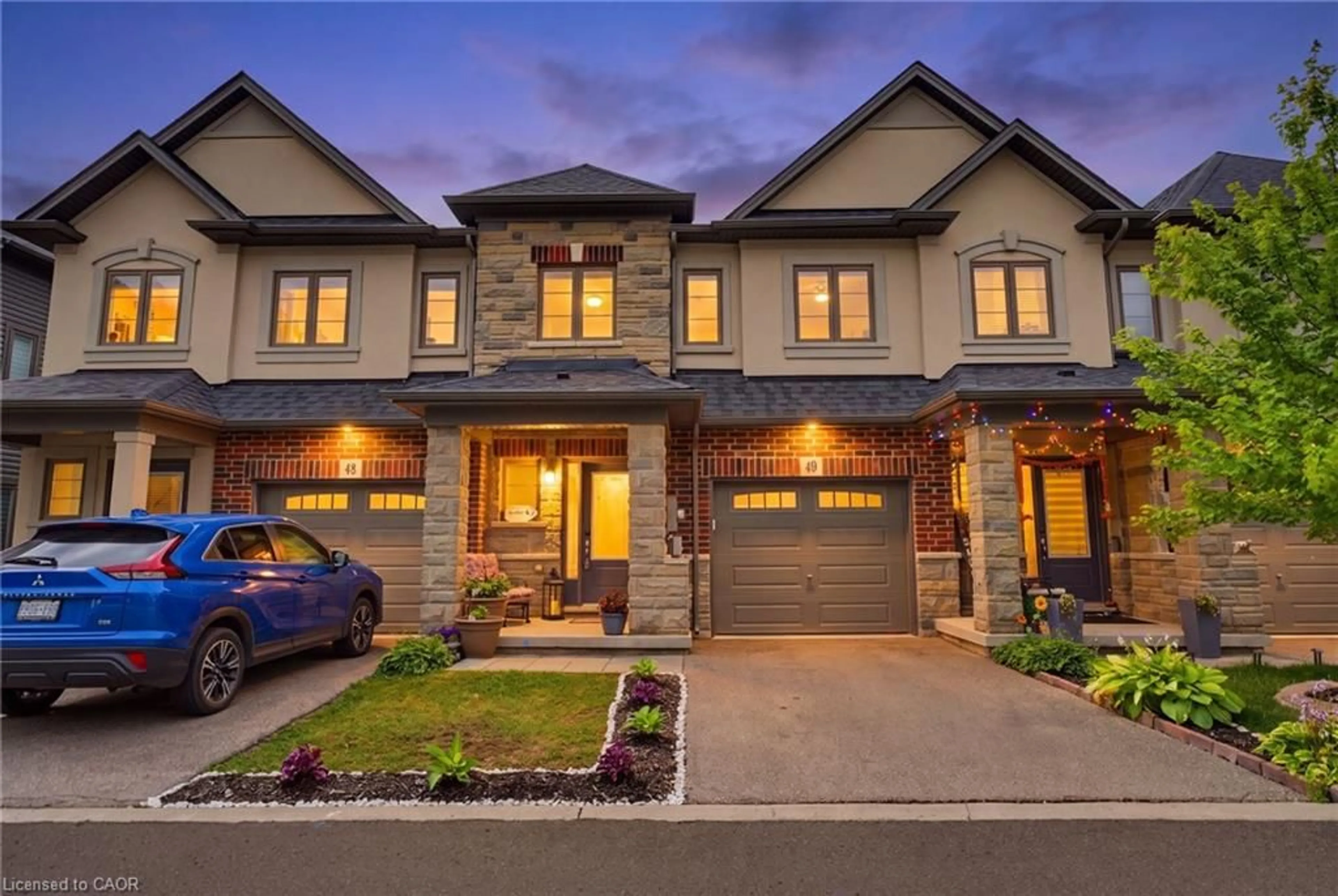 Home with brick exterior material, street for 324 Equestrian Way #49, Cambridge Ontario N3E 0E2