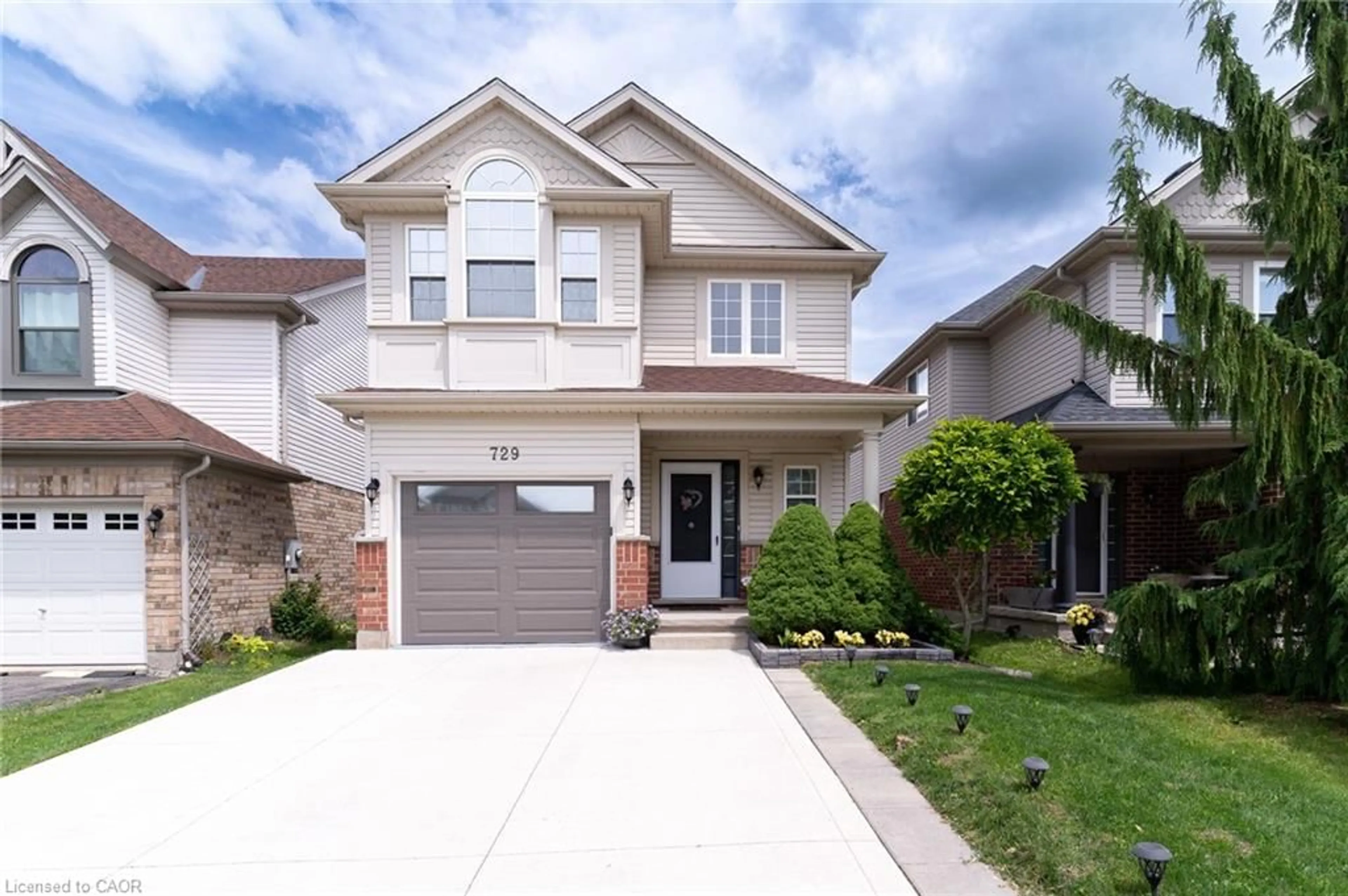 Home with brick exterior material, street for 729 Grand Banks Dr, Waterloo Ontario N2K 4M2