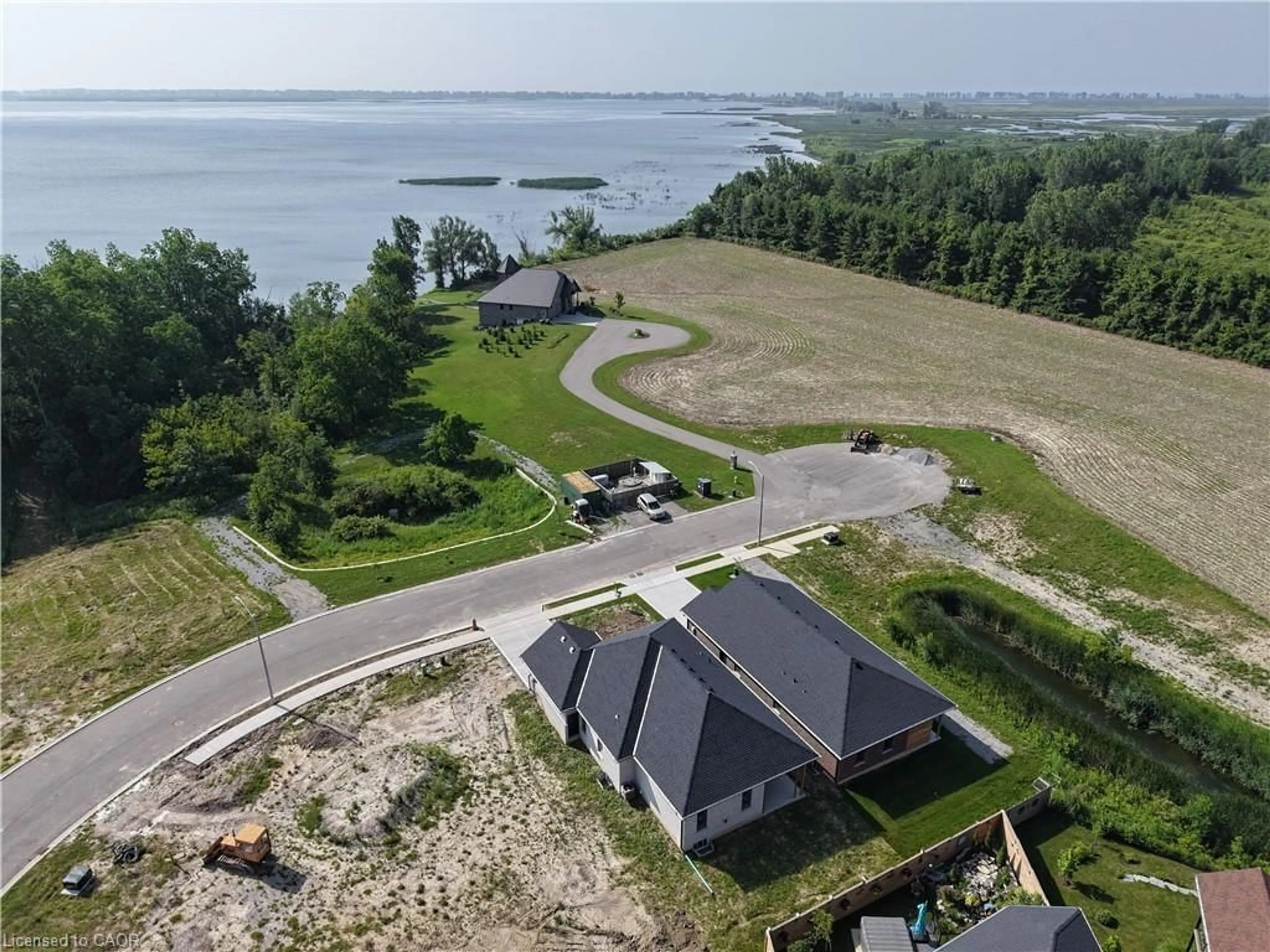 A pic from outside/outdoor area/front of a property/back of a property/a pic from drone, water/lake/river/ocean view for 67 Hunter Dr, Port Rowan Ontario N0E 1M0