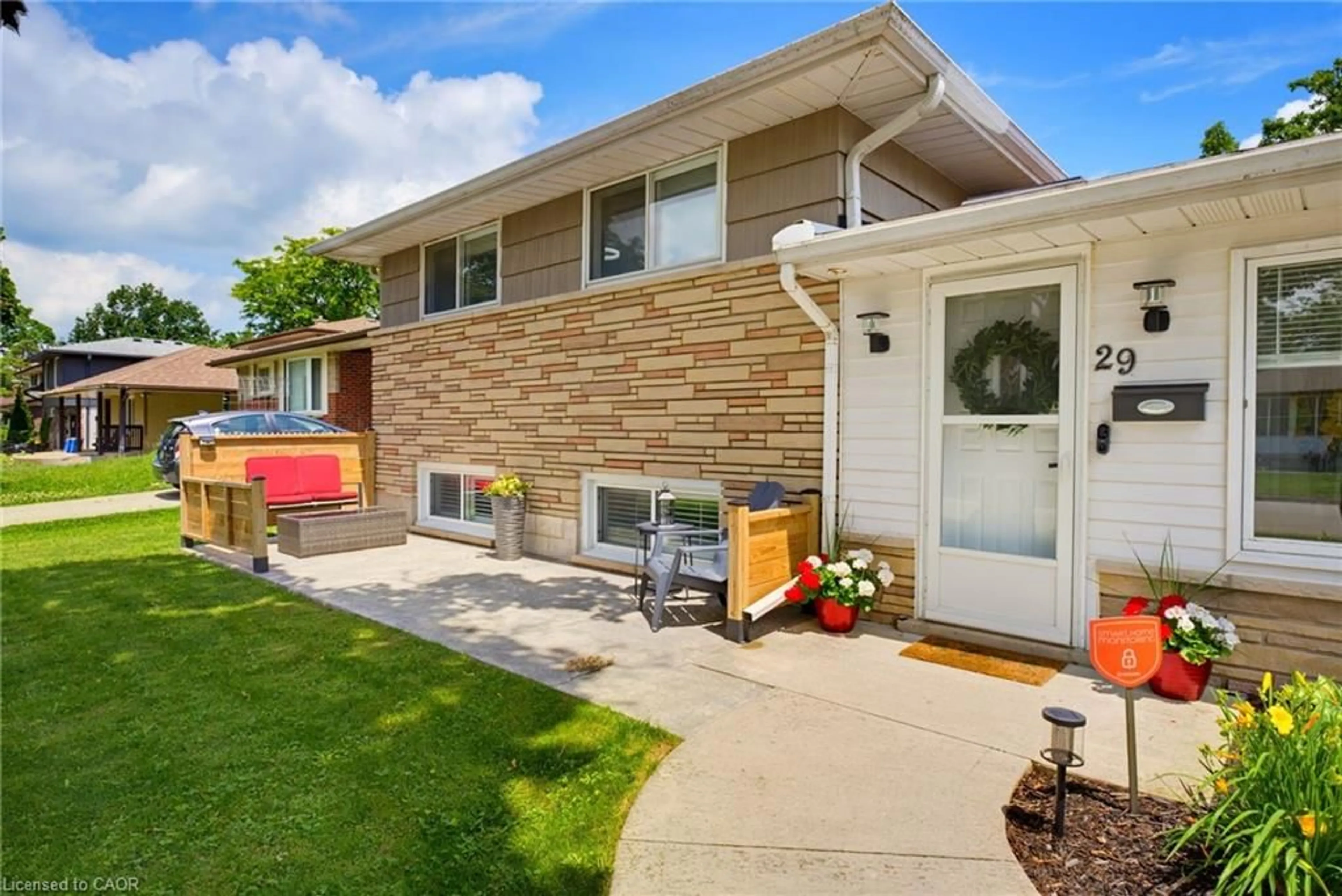 Home with brick exterior material, street for 29 Woodland Dr, Cambridge Ontario N1R 2X7